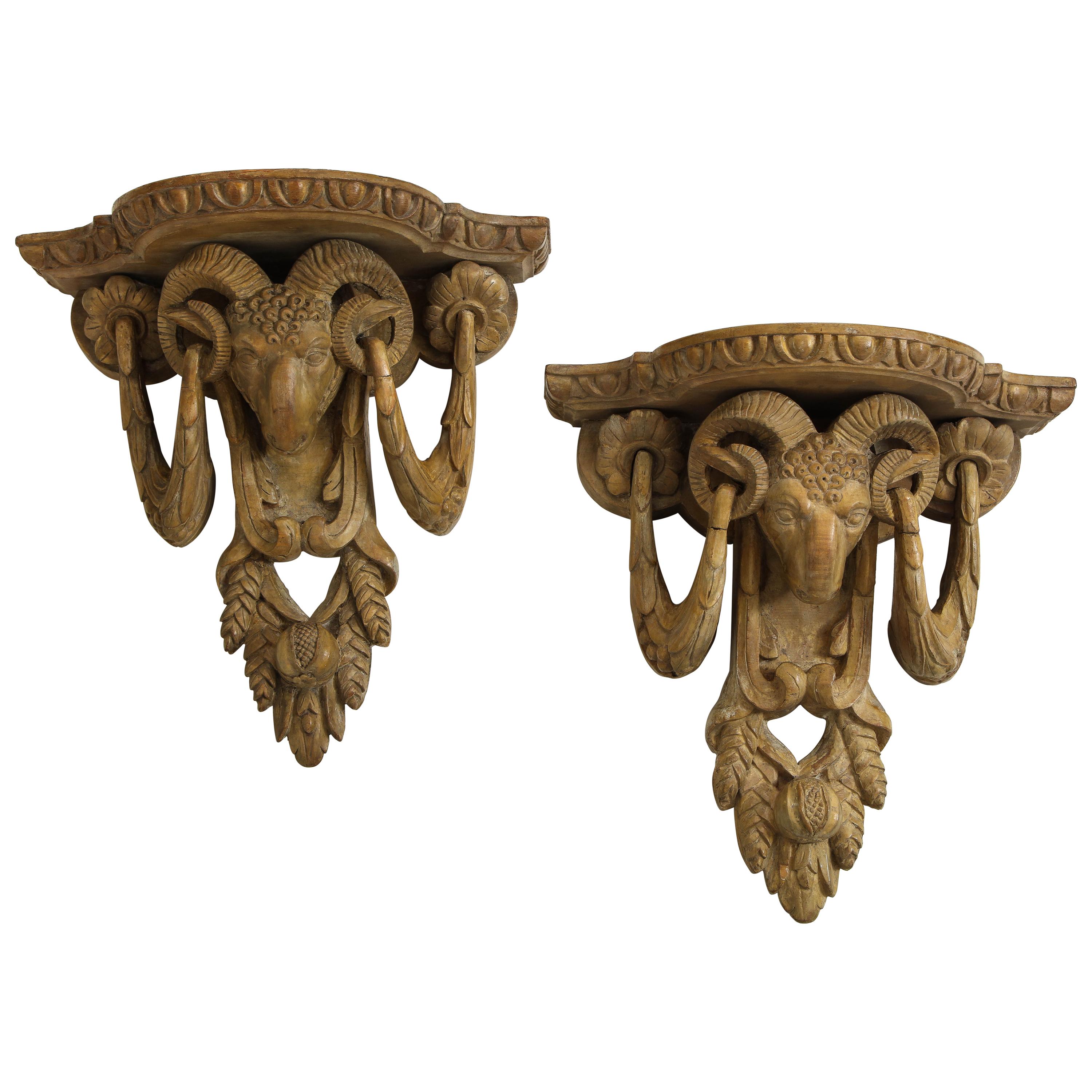 Pair of Neoclassical Ram's Head Limed Wall Brackets