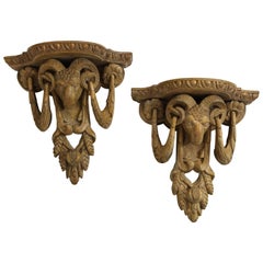 Pair of Neoclassical Ram's Head Limed Wall Brackets