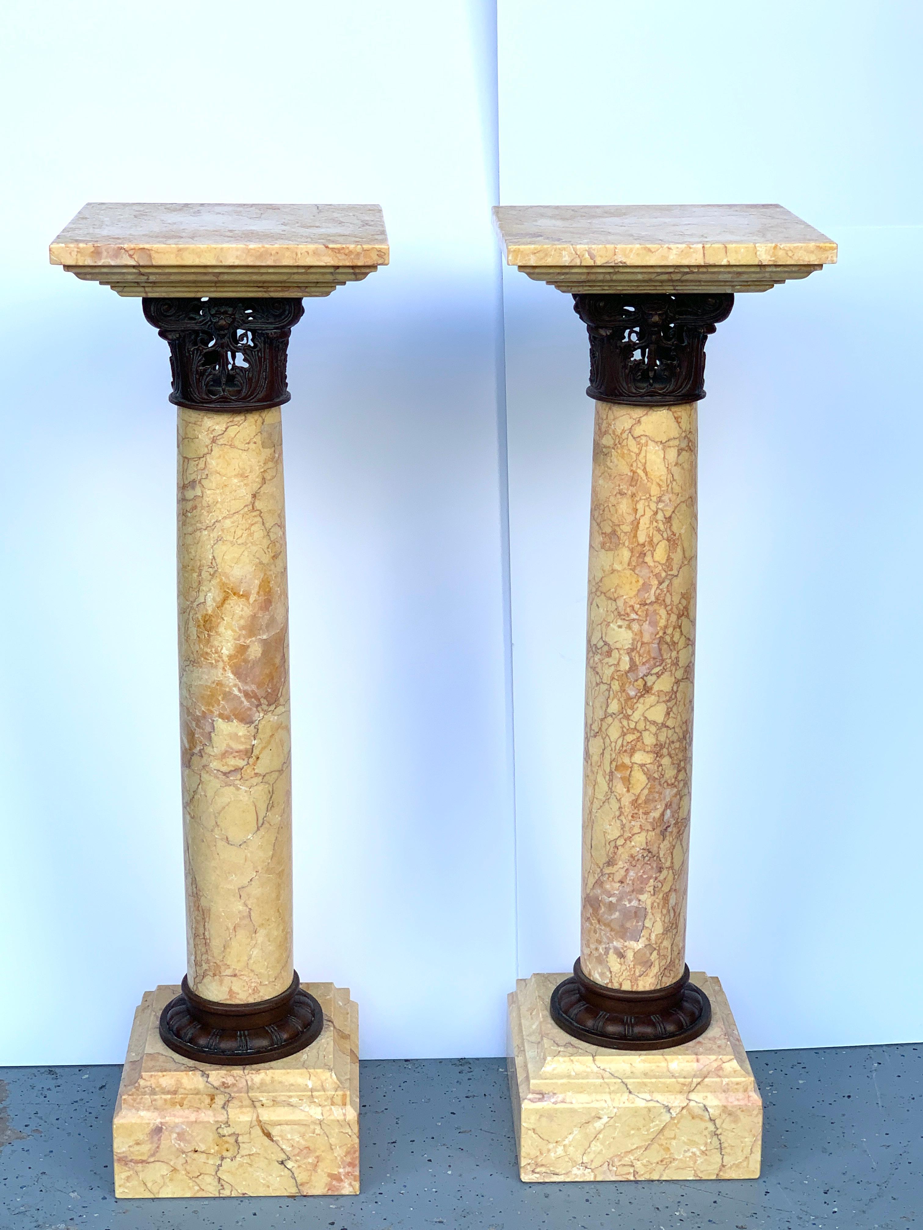 Pair of neoclassical Siena marble and bronze pedestals, each one of typical form standing 41.5