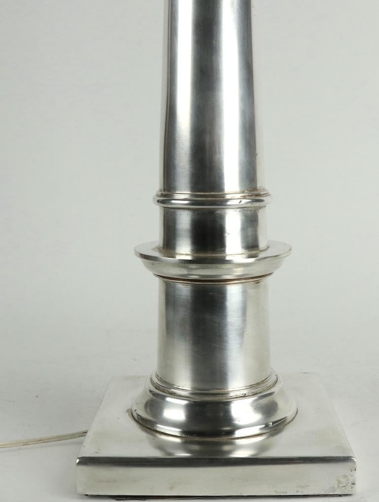 pair of silver lamps