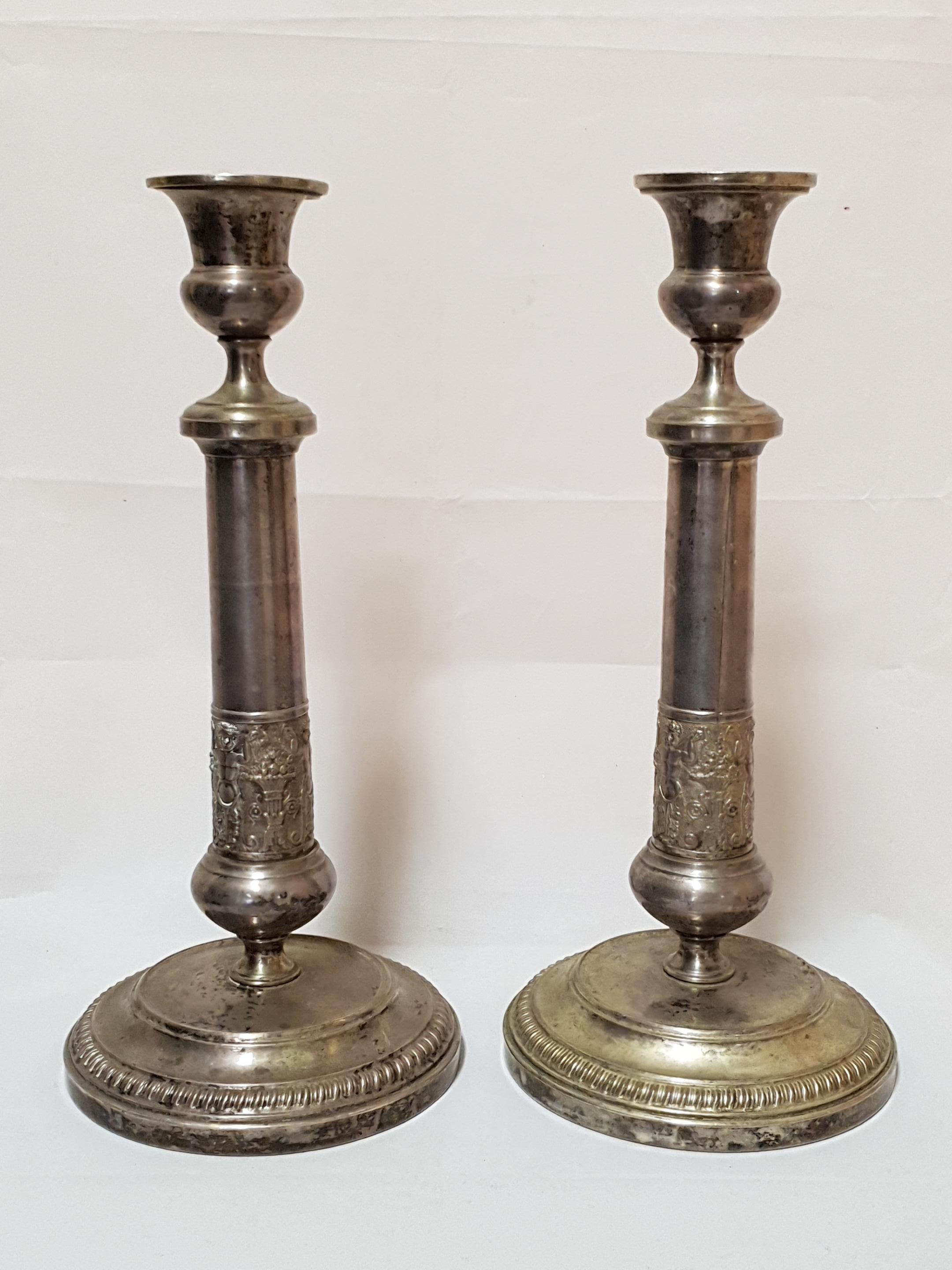 Pair of neoclassical silver plated candlesticks
Marked under the base.