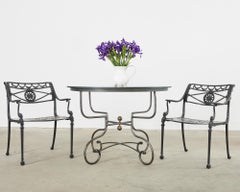 Pair of Neoclassical Star and Dolphin Garden Dining Armchairs