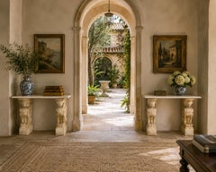 Pair of Neoclassical Stone Console Tables with Winged Mythological Stone Bases