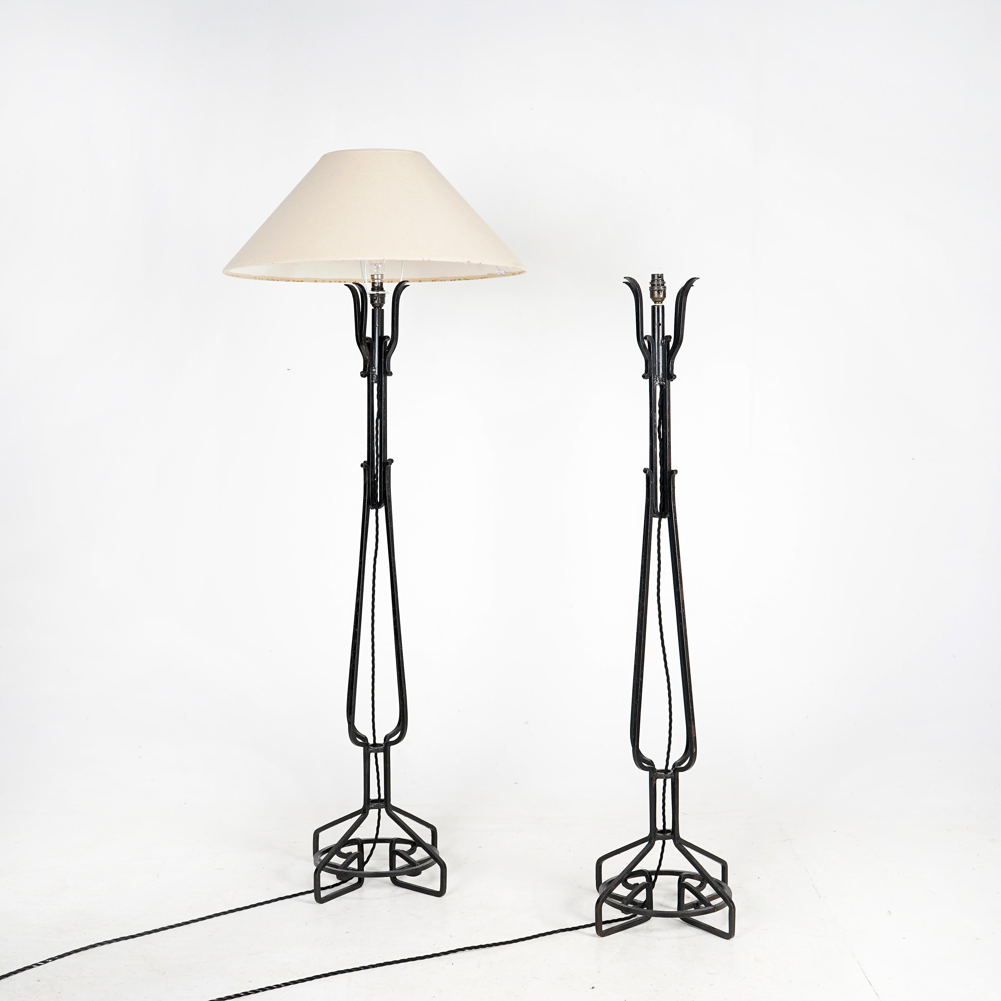 Pair of handmade neoclassical style Iron floor lamps. An incredible pair of unique lights, most probably English mid to late 20th century. Really nice to have a pair.  Re-wired and PAT tested. 
 
Dimensions
 
H 126cm Base 38cm x 38cm 
 
About Us 