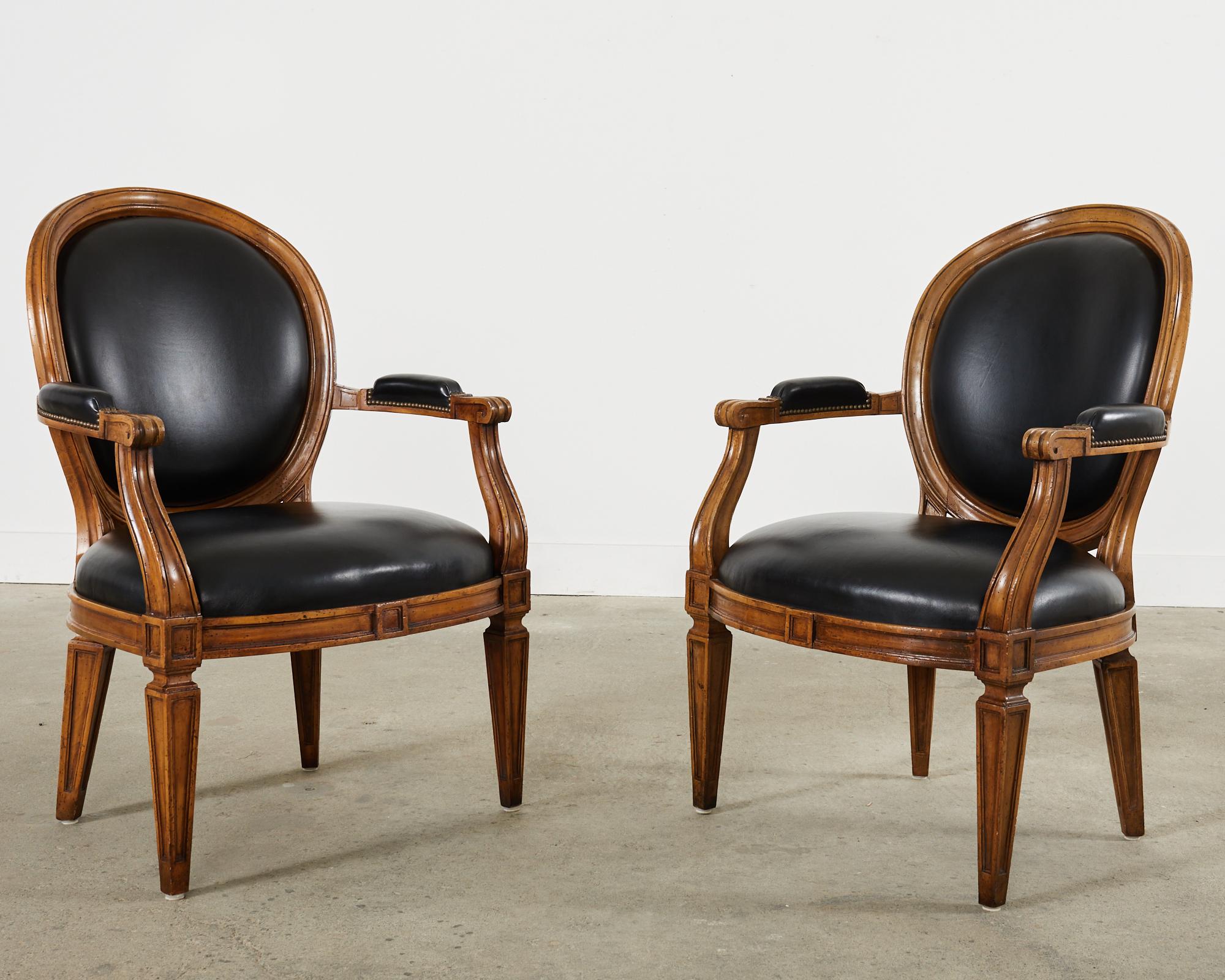 American Pair of Neoclassical Style Black Leather Library Armchairs