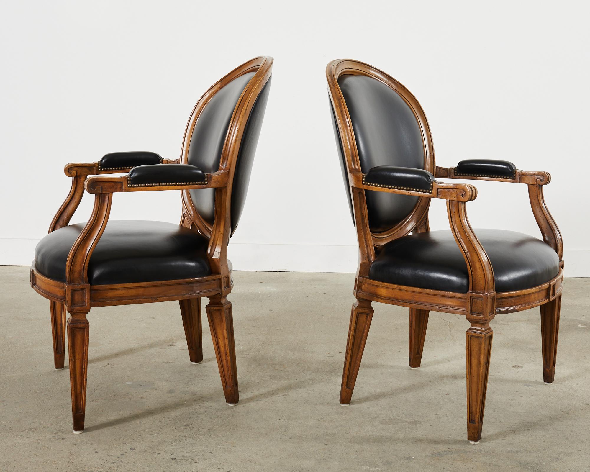 Hand-Crafted Pair of Neoclassical Style Black Leather Library Armchairs