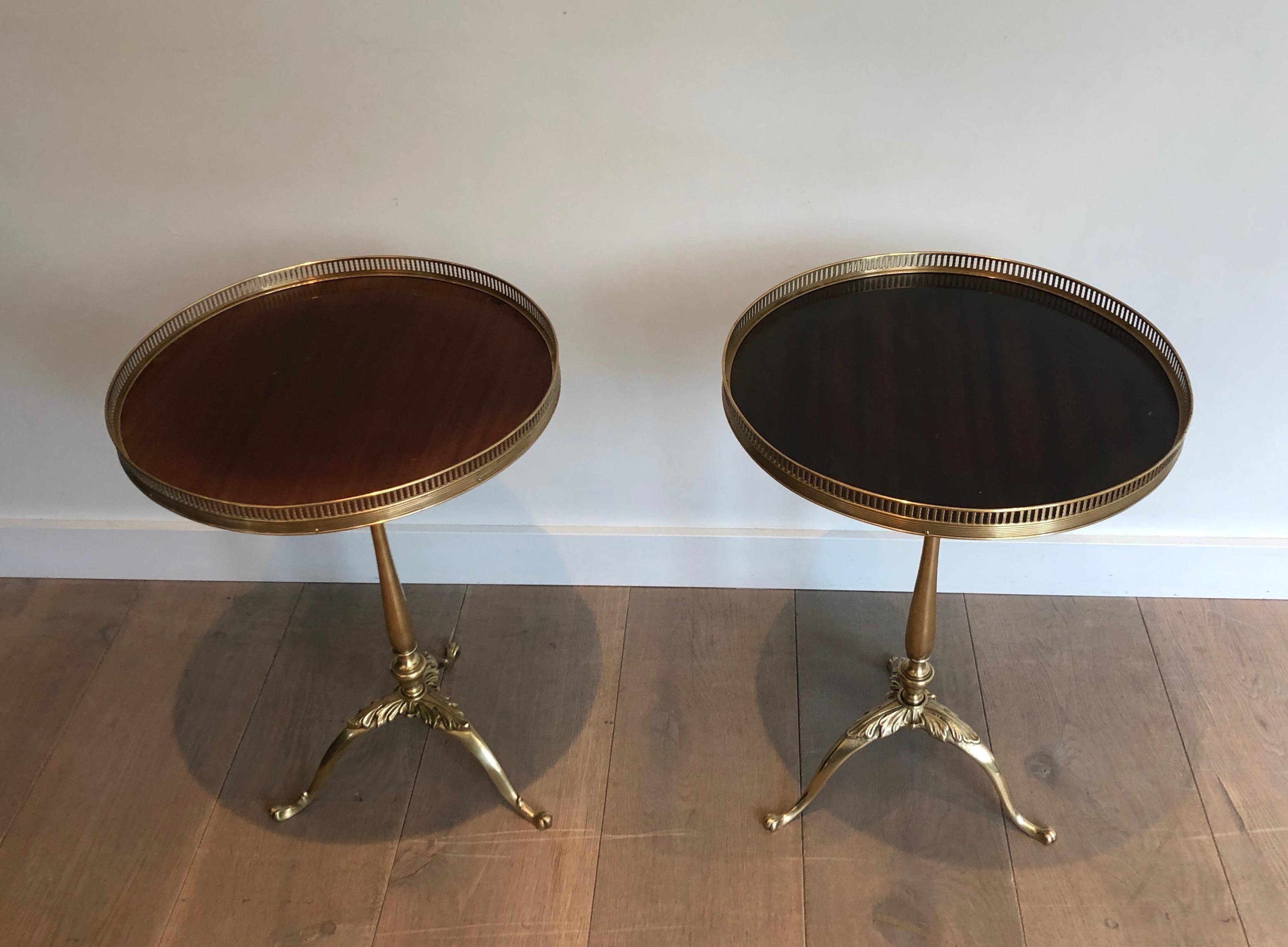 This nice pair of neoclassical style side tables also called Martini tables are made of brass and mahogany. These end tables are attributed to famous French designer Maison Jansen, circa 1940
We have 3 of these tables.