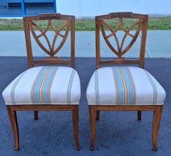 Pair of Neoclassical Style Carved Fruitwood and Upholstered Side Chairs