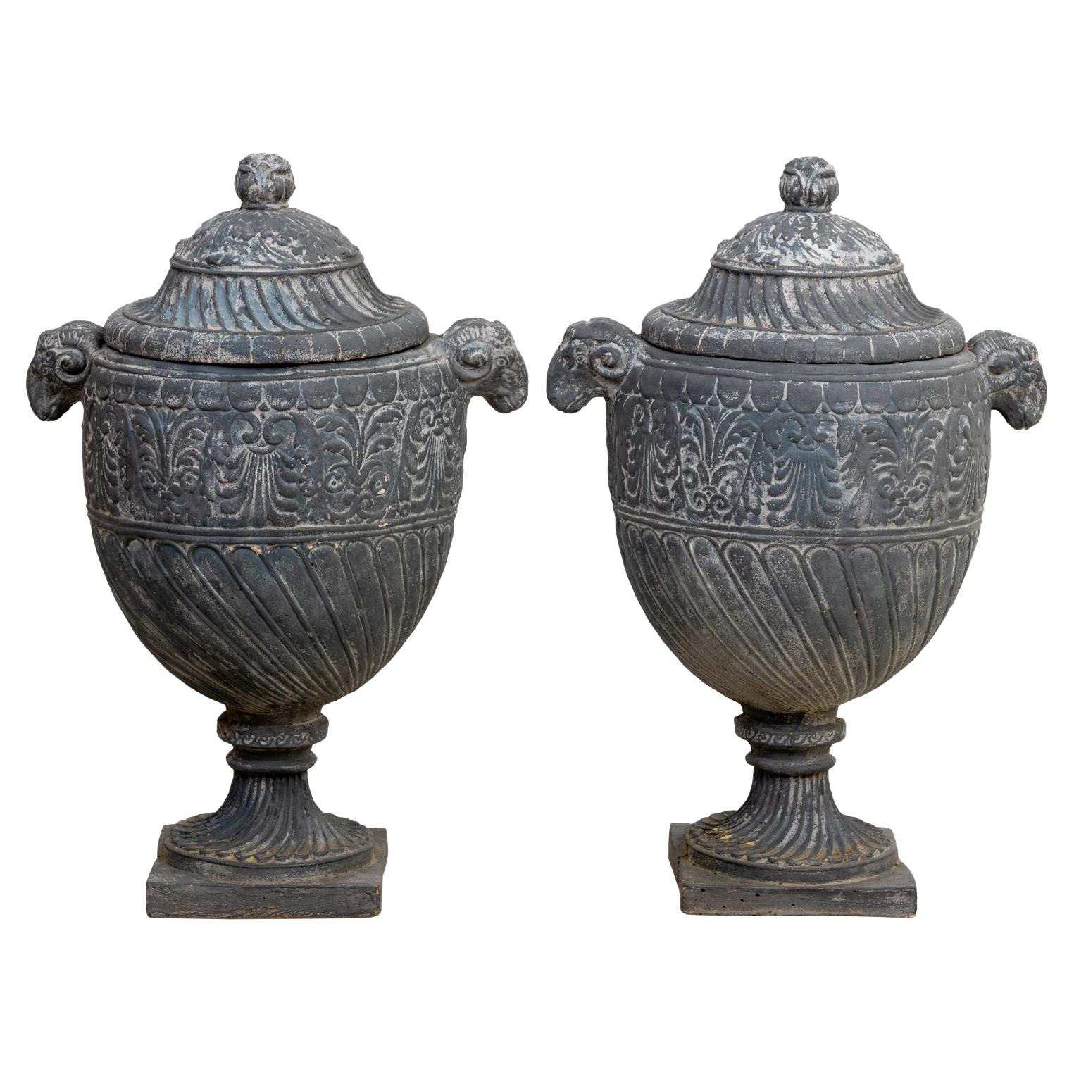 Pair of Neoclassical Style Cast Stone Urns with Lids