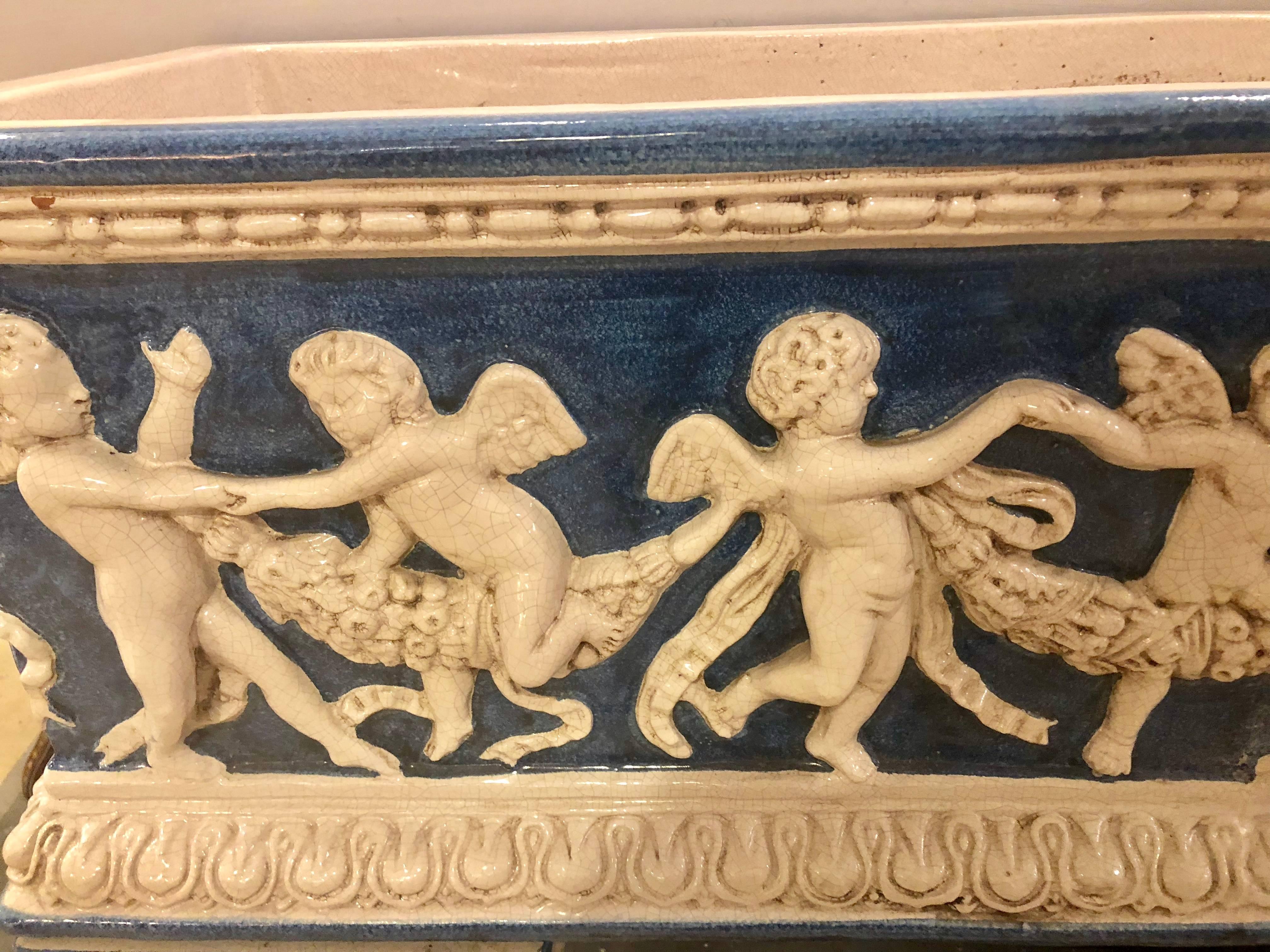 Pair of Neoclassical Style Ceramic Planter Tops Depicting Cherubs Dancing 3