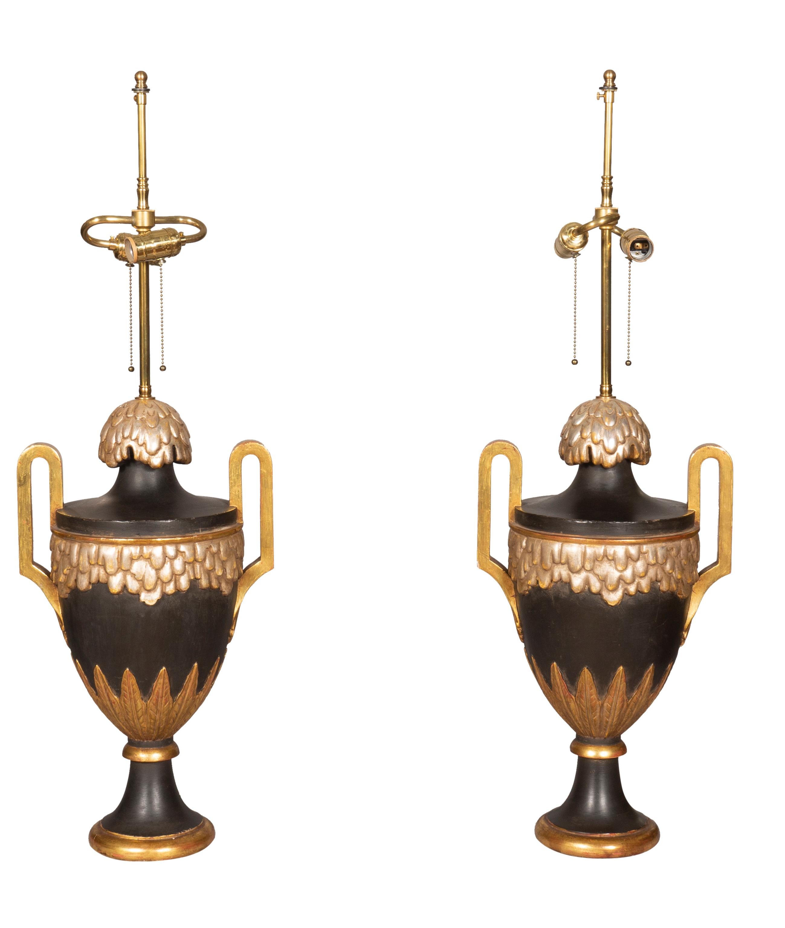 With urn form with bronze and gilded finish and handles, with shades. Estate Of Martin Trust, Boston and Palm Beach.