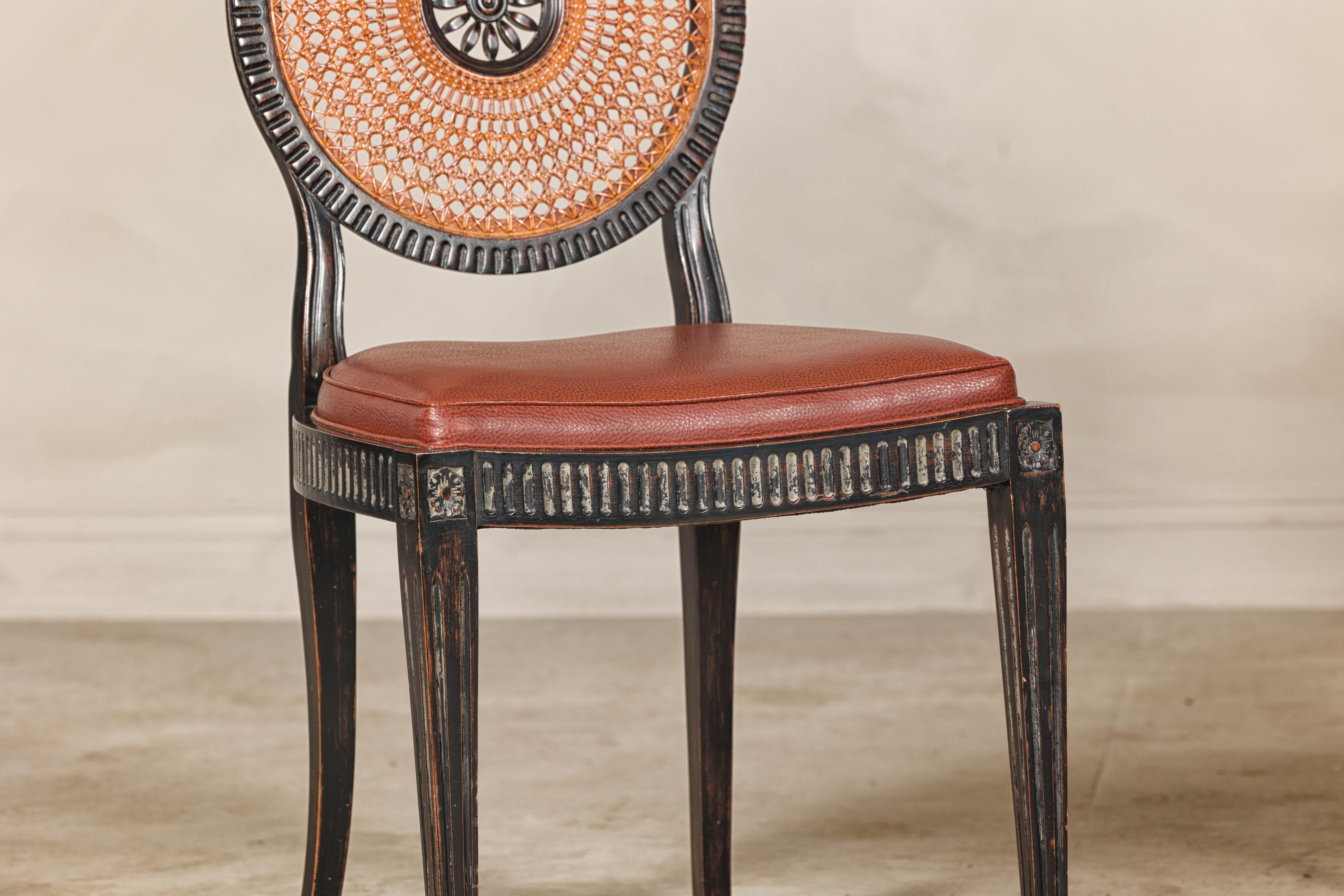 20th Century Pair of Neoclassical Style Dining Chairs with Leather Seats and Rattan Backs