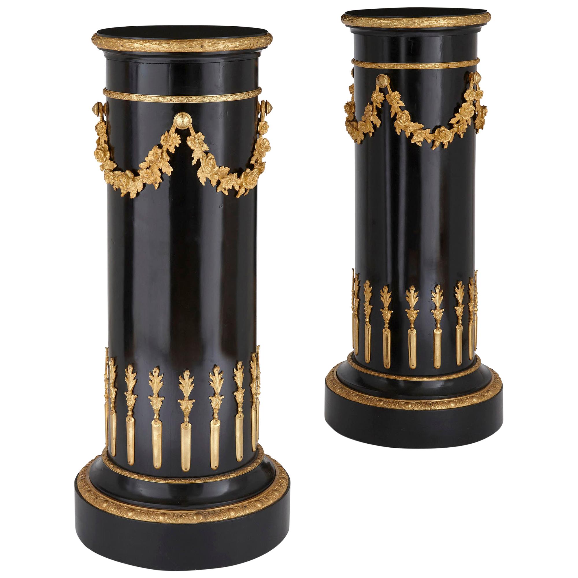 Pair of Neoclassical Style Gilt Bronze and Ebonized Wood Stands