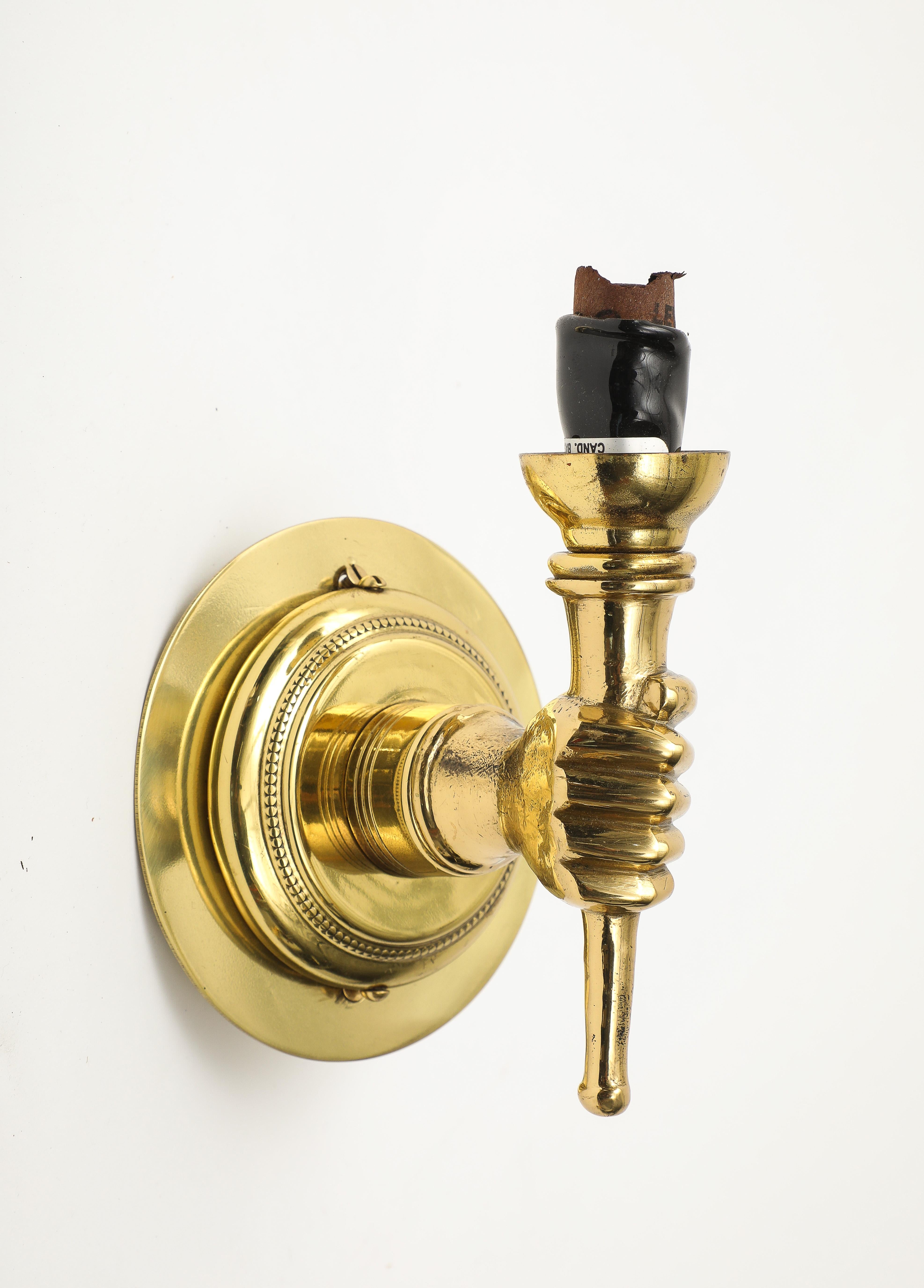 Pair of Neoclassical style gilt bronze hand sconces by Andre Arbus, French 1950s. Black lampshades included. Wired for USA. 

Shades: 5