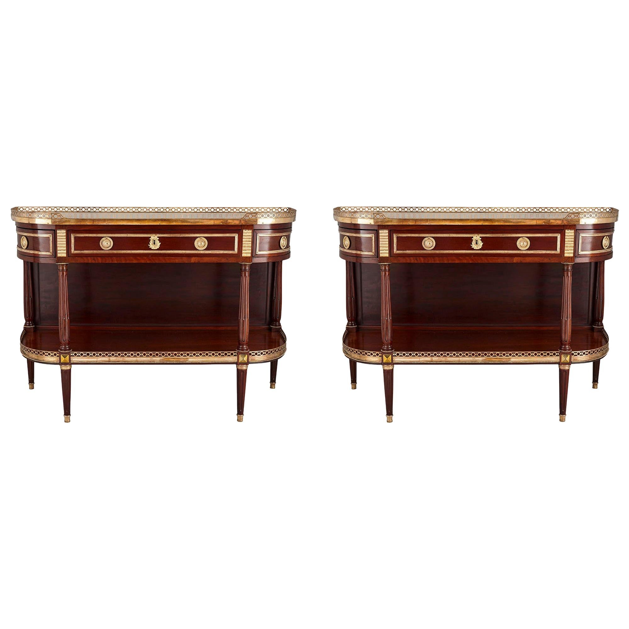 Pair of Neoclassical Style Gilt Bronze Mounted French Consoles For Sale