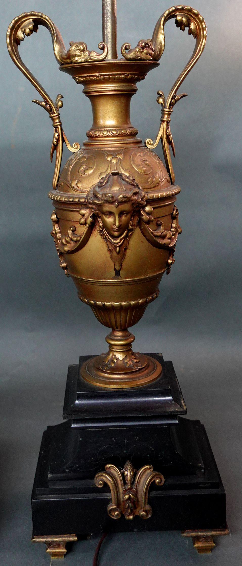 North American Pair of Neoclassical-Style Gilt-Bronze Urns Lamps on Black Marble Bases For Sale