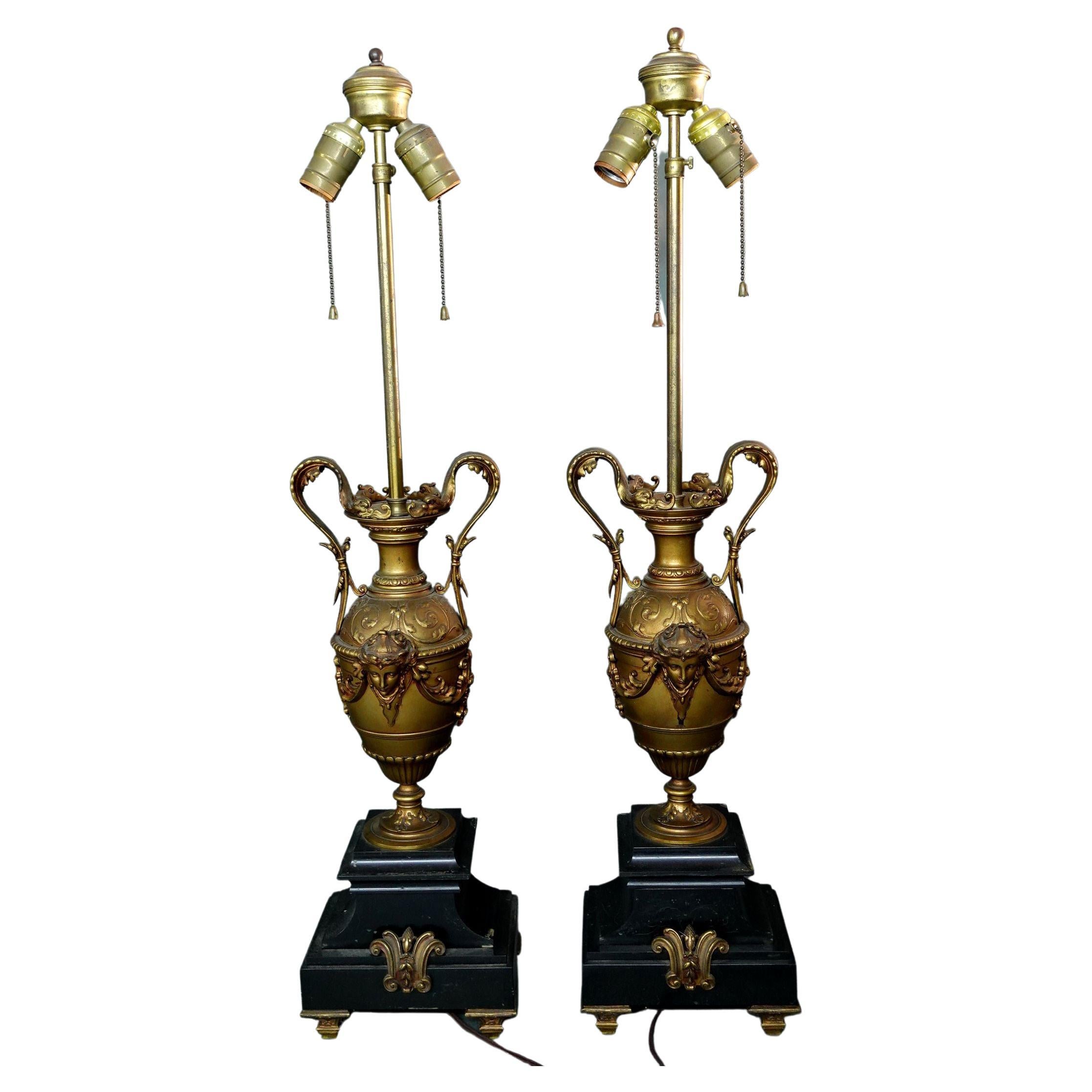 Pair of Neoclassical-Style Gilt-Bronze Urns Lamps on Black Marble Bases