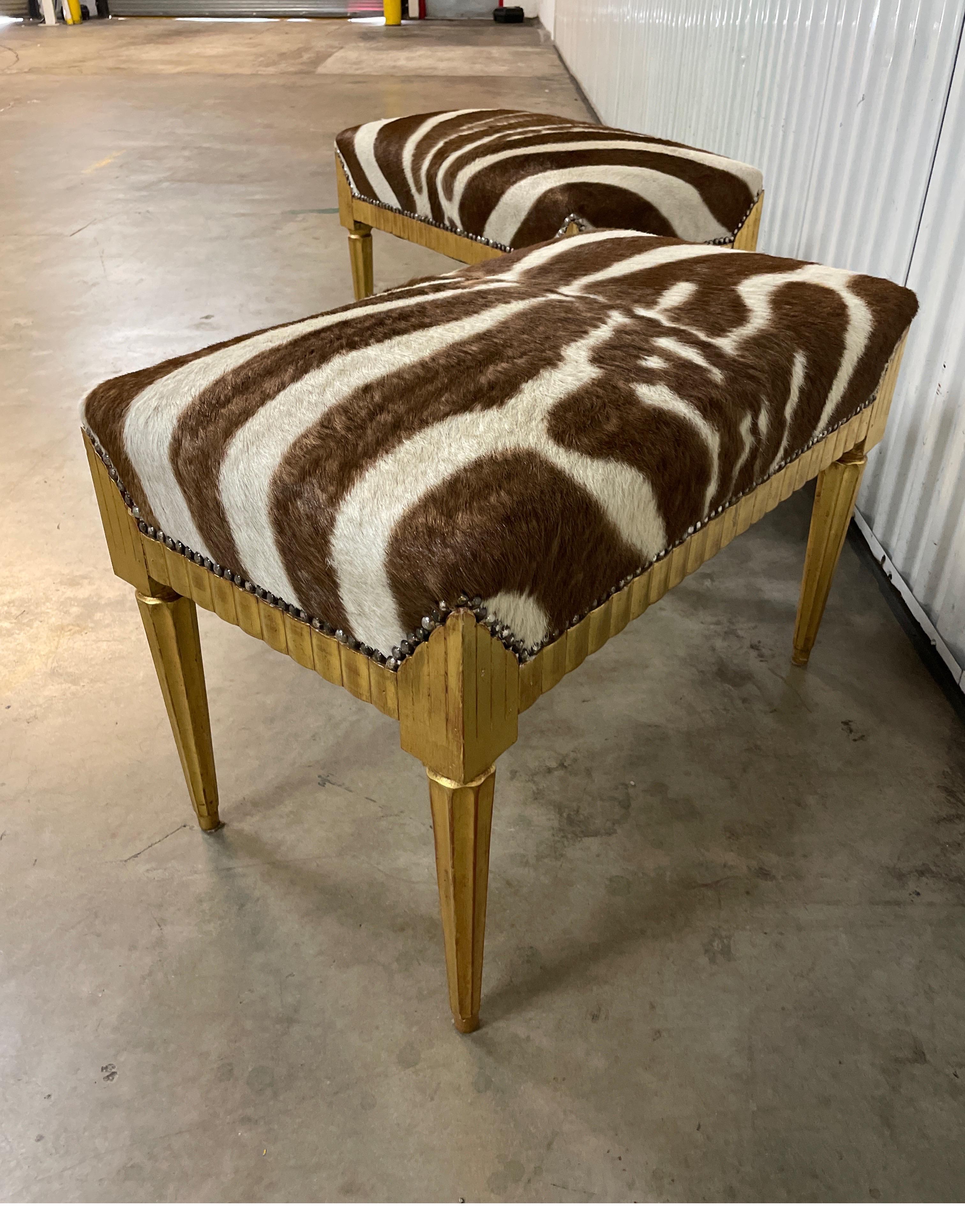 20th Century Pair of Neoclassical Style Giltwood Benches with Zebra Hide Seats