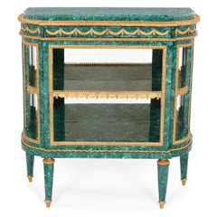 Coppia di commodes in stile neoclassico in malachite e bronzo dorato