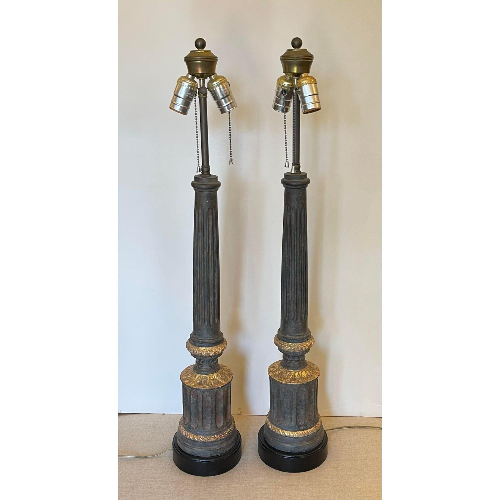 Neoclassical Style Nancy Corzine column form giltwood table lamps - a pair.

Additional information:
Materials: Giltwood
Color: Gold
Brand: Nancy Corzine
Designer: Nancy Corzine
Period: 2000 - 2009
Styles: Neoclassical
Lamp Shade: Not