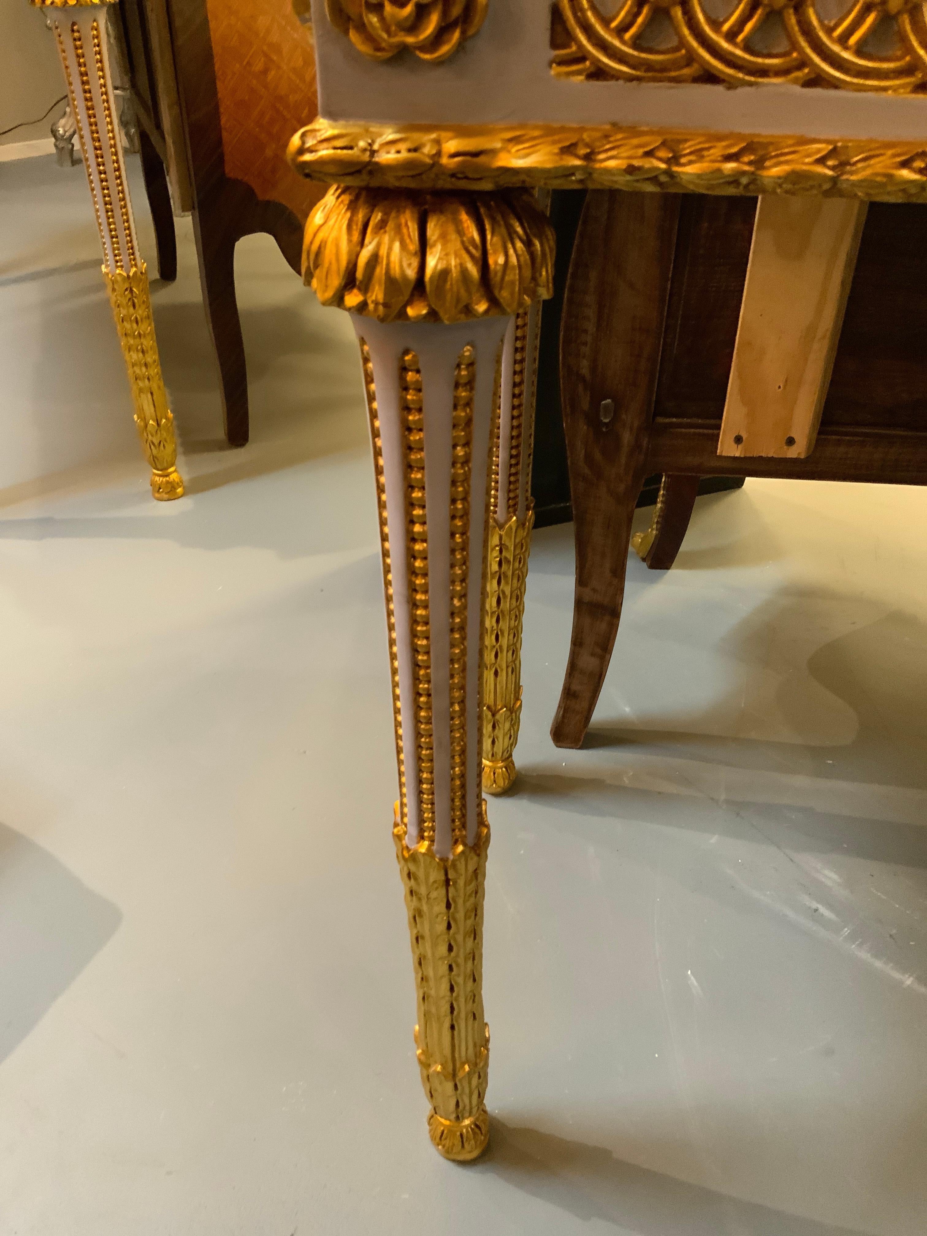 Pair of Neoclassical Style parcel gilt and gray painted marble top consoles For Sale 4