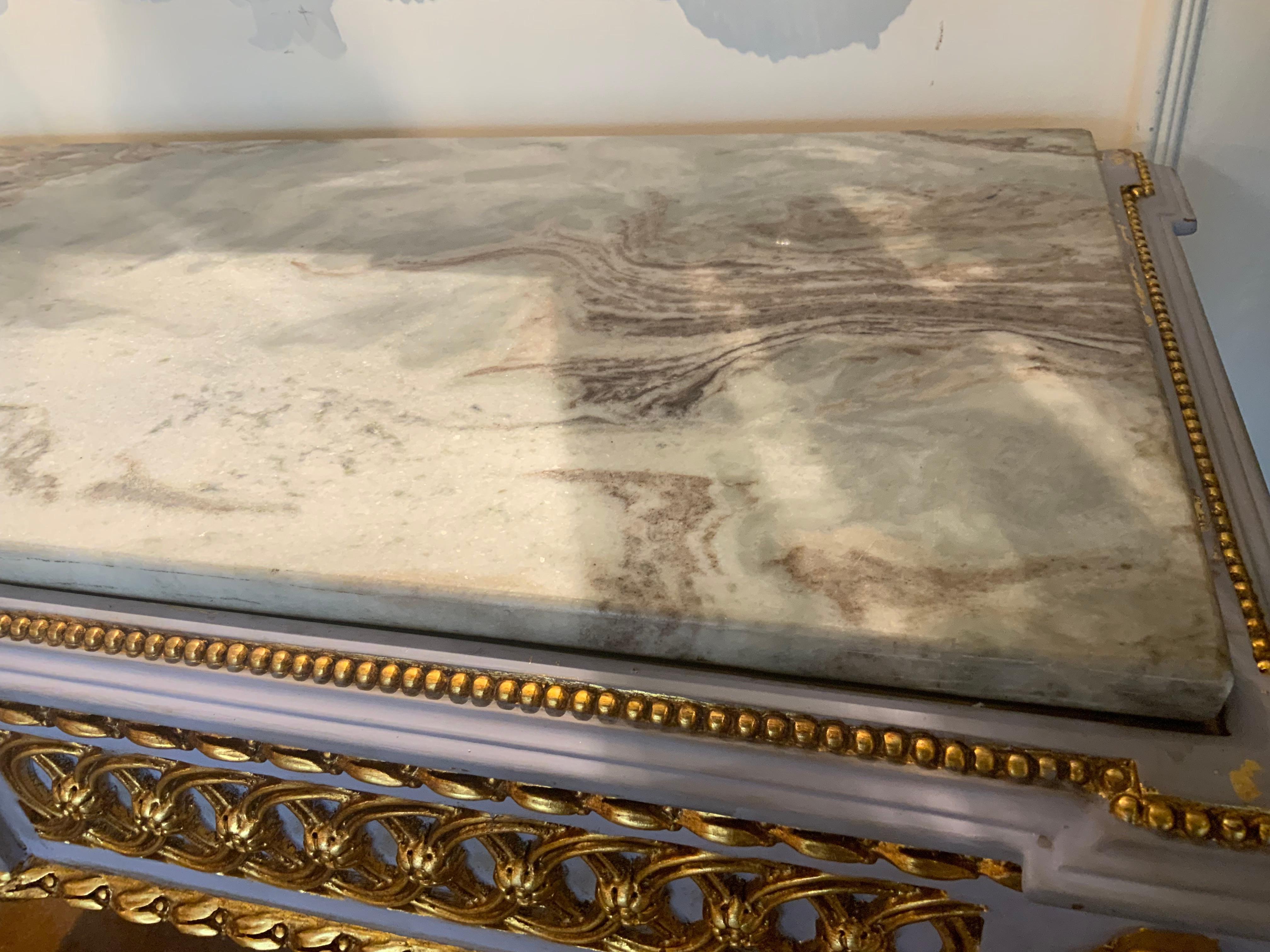 Italian Pair of Neoclassical Style parcel gilt and gray painted marble top consoles For Sale