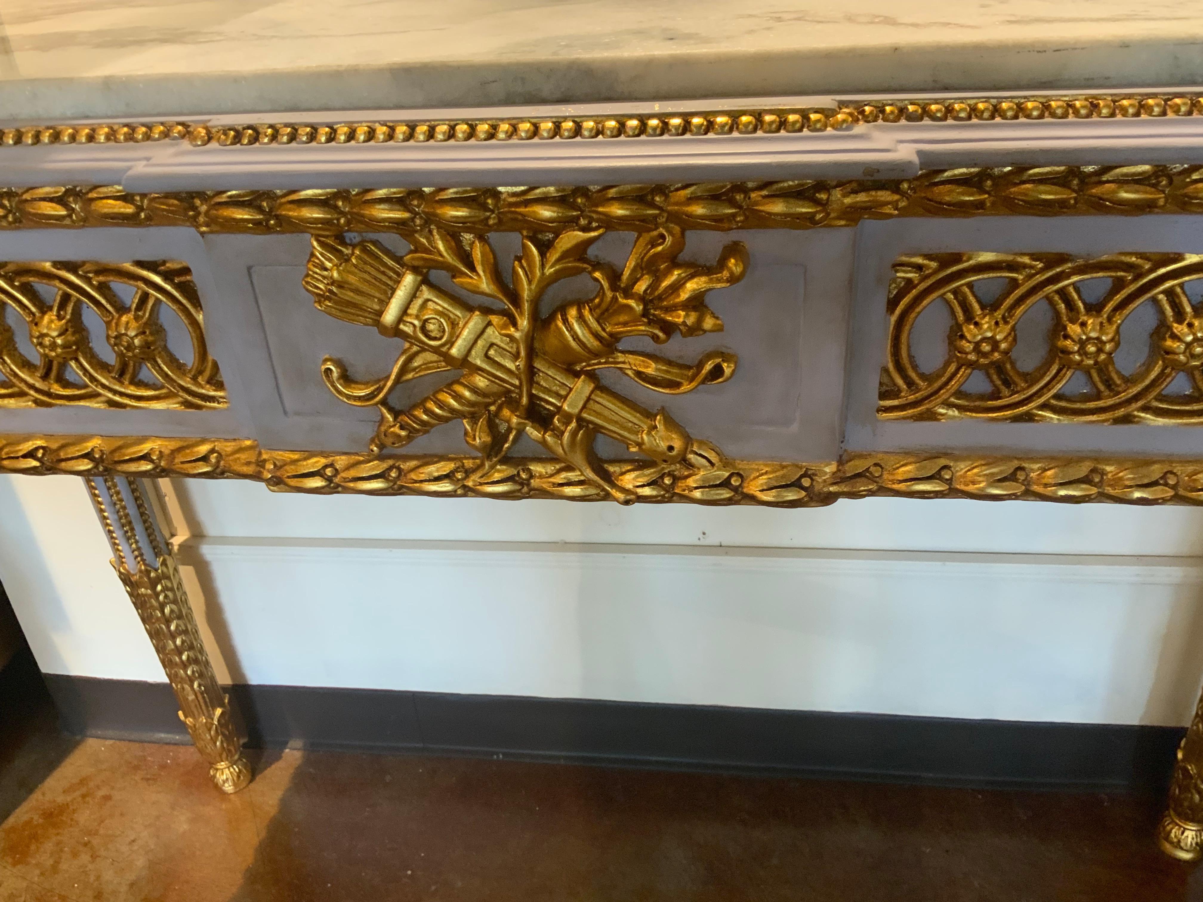 Contemporary Pair of Neoclassical Style parcel gilt and gray painted marble top consoles For Sale
