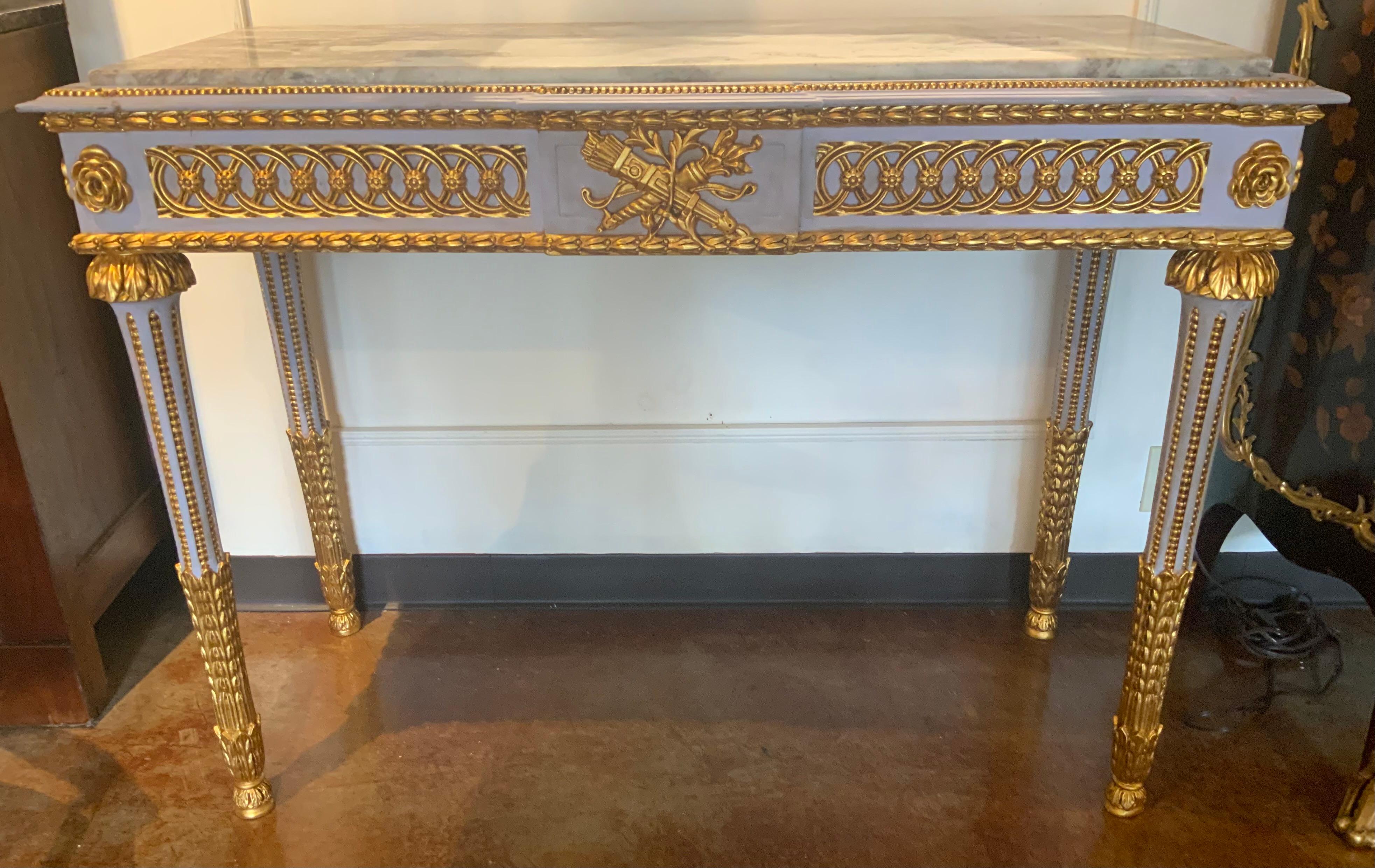 Marble Pair of Neoclassical Style parcel gilt and gray painted marble top consoles For Sale