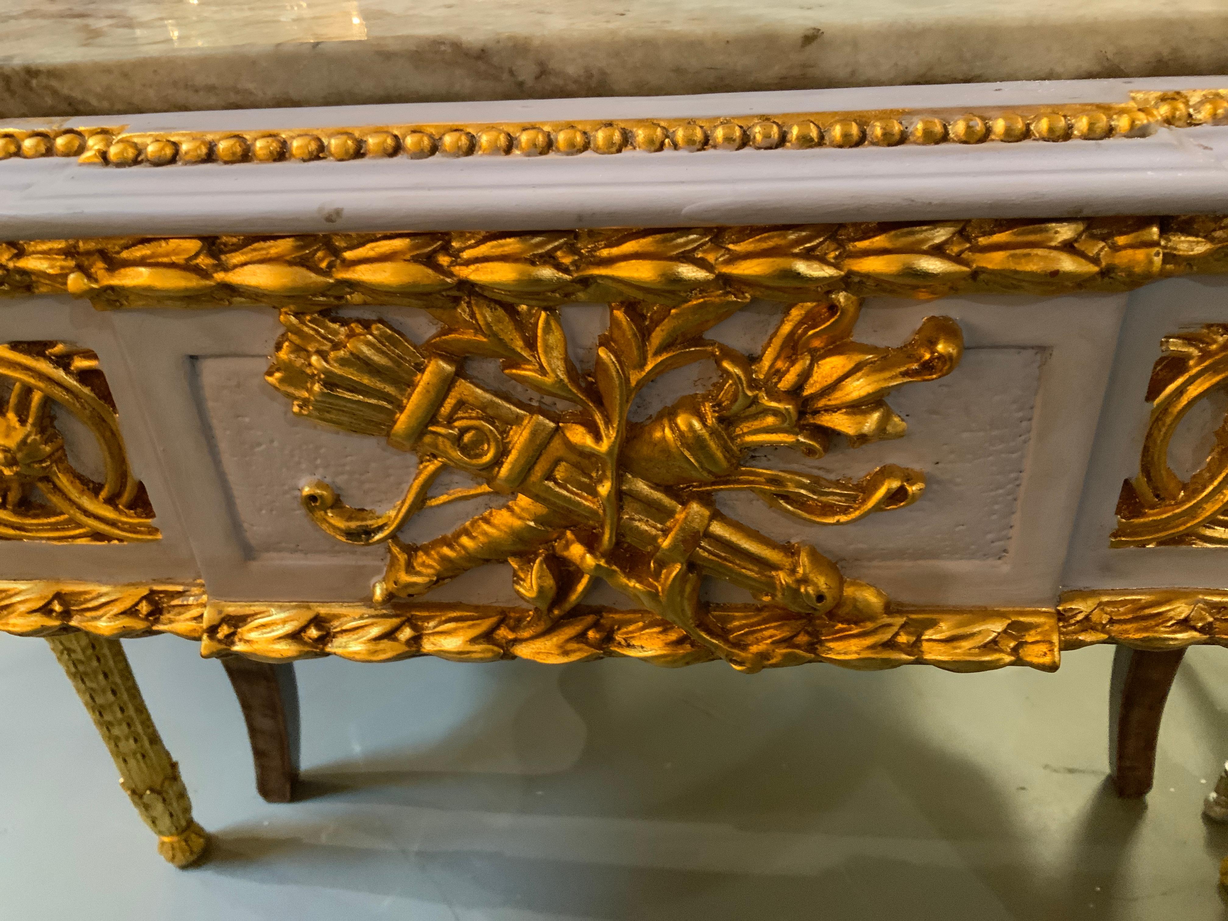 Pair of Neoclassical Style parcel gilt and gray painted marble top consoles For Sale 2