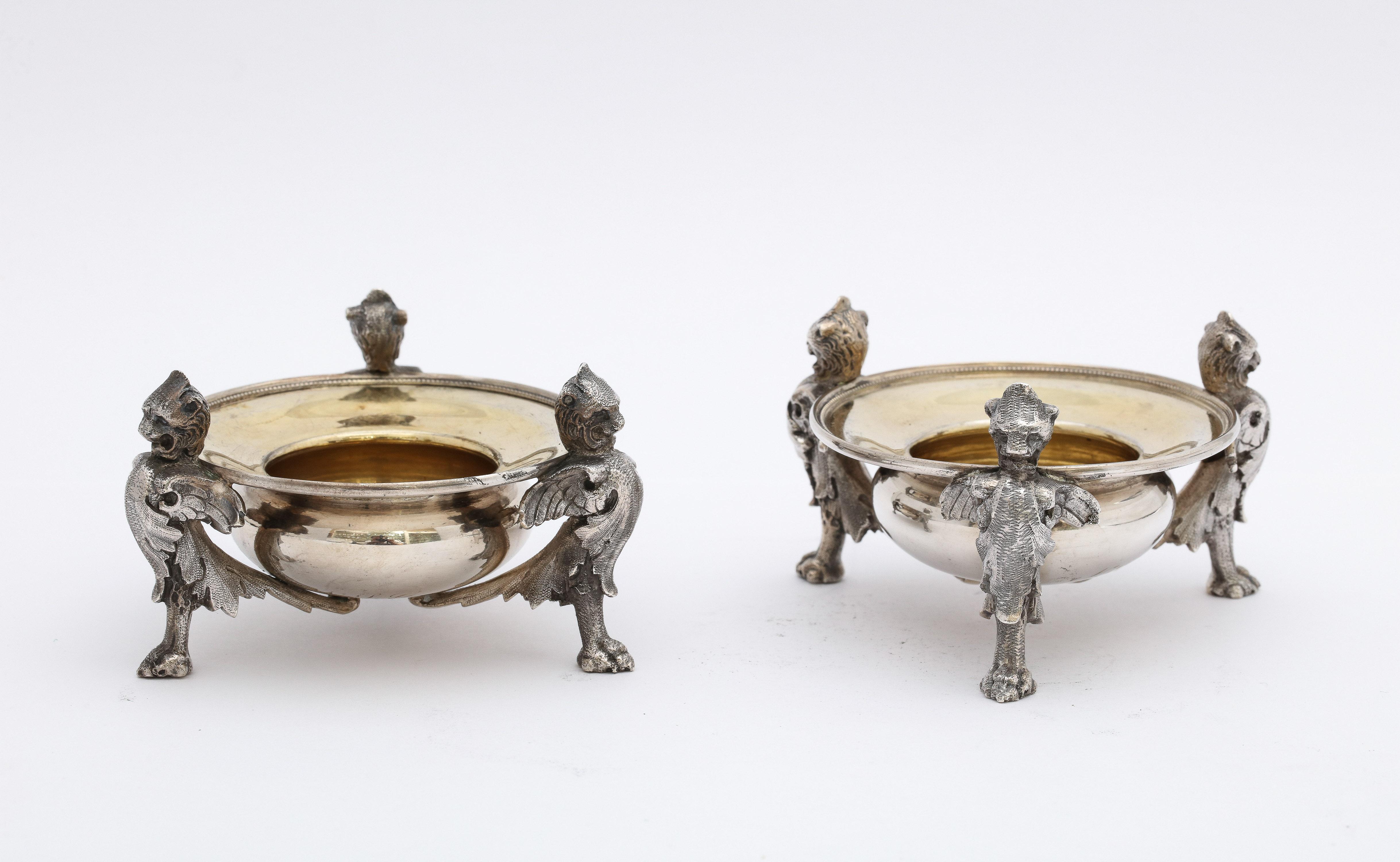 American Pair of Neoclassical-Style Parcel Gilt Coin Silver Footed Salt Cellars By Gorham For Sale