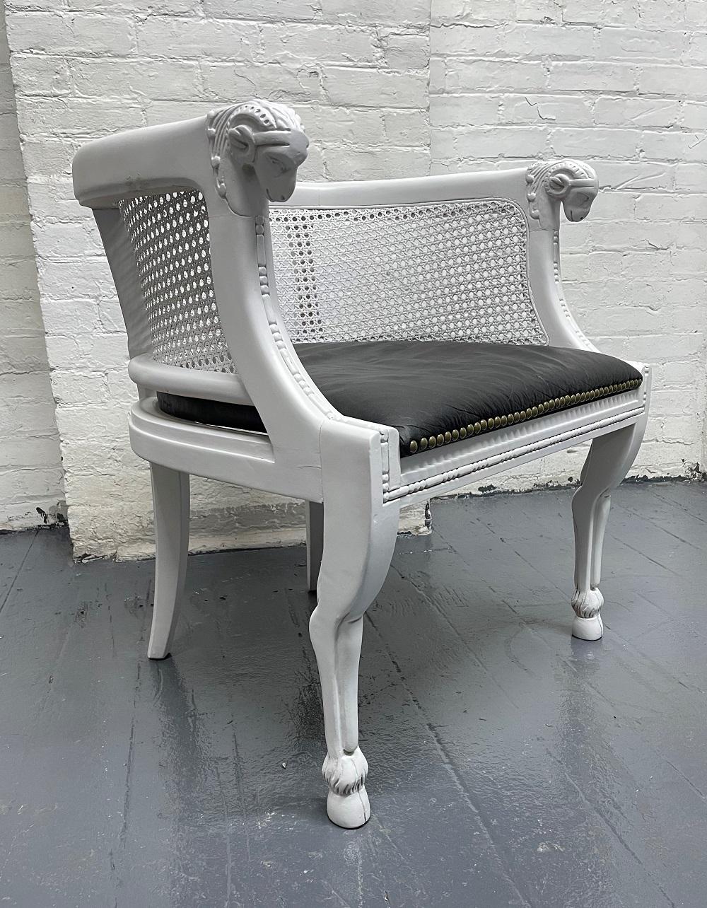 Pair of Neoclassical Style Rams Head Bergere Chairs In Good Condition For Sale In New York, NY