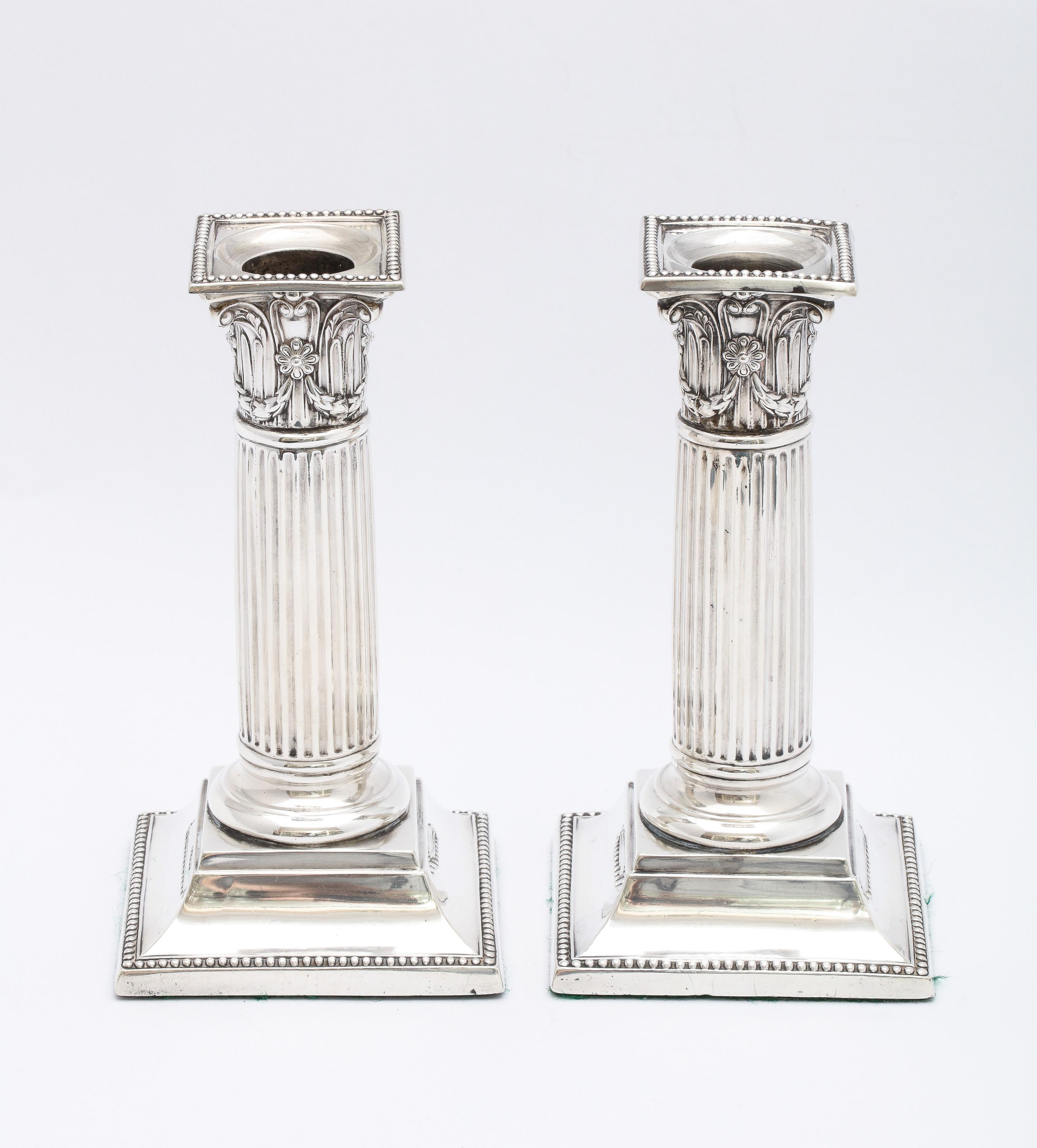 English Pair of Neoclassical Style Sterling Silver Corinthian Column Candlesticks