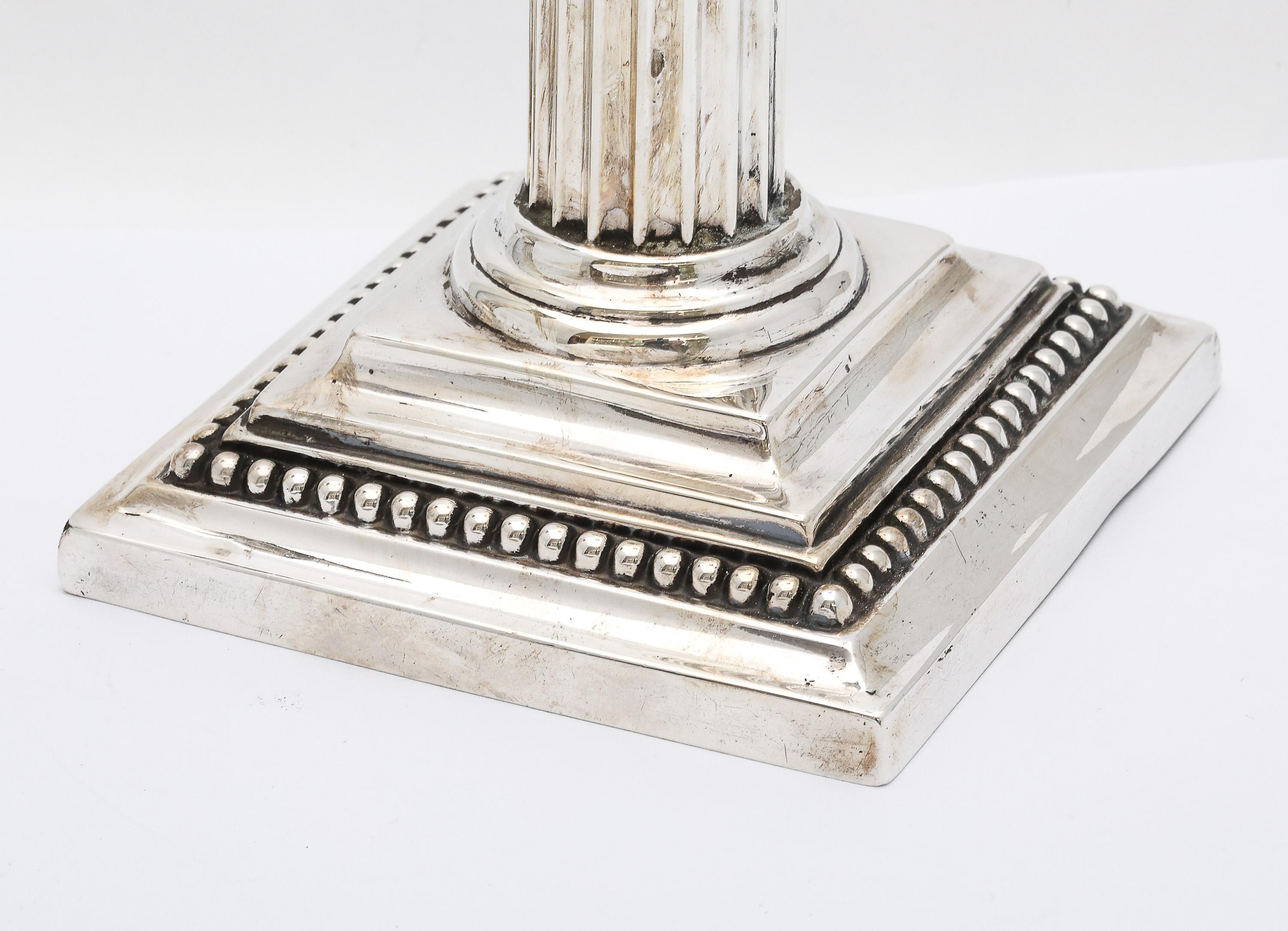 Early 20th Century Pair of Neoclassical-Style Sterling Silver Corinthian Column Candlesticks For Sale