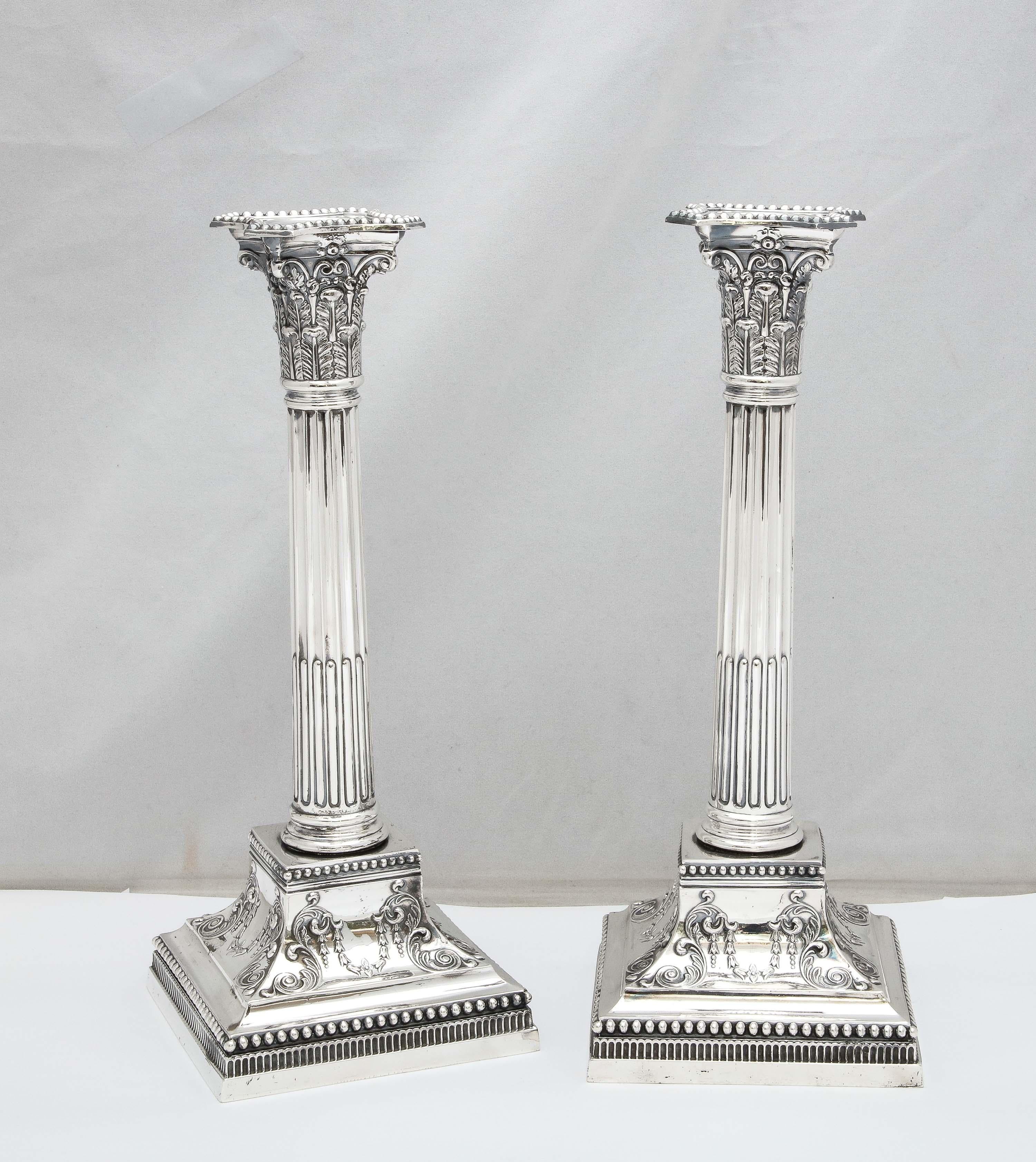 Early 20th Century Pair of Neoclassical-Style Tall Sterling Silver Corinthian Column Candlesticks