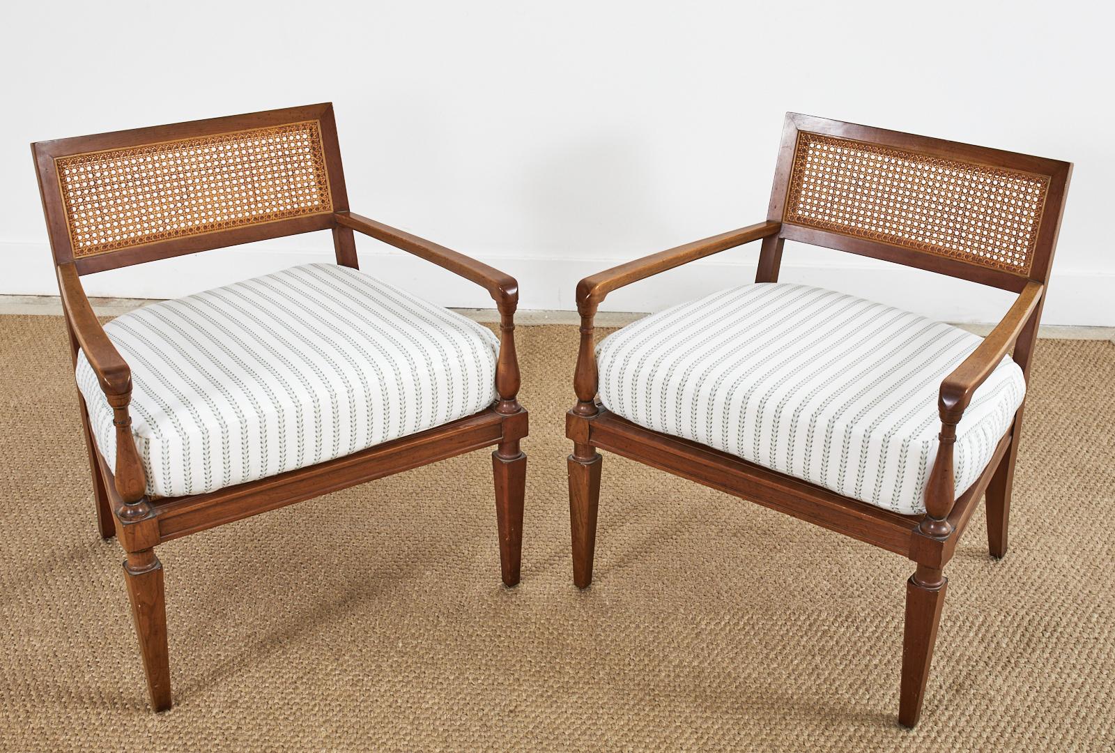 American Pair of Neoclassical Style Walnut Cane Lounge Chairs by Baker