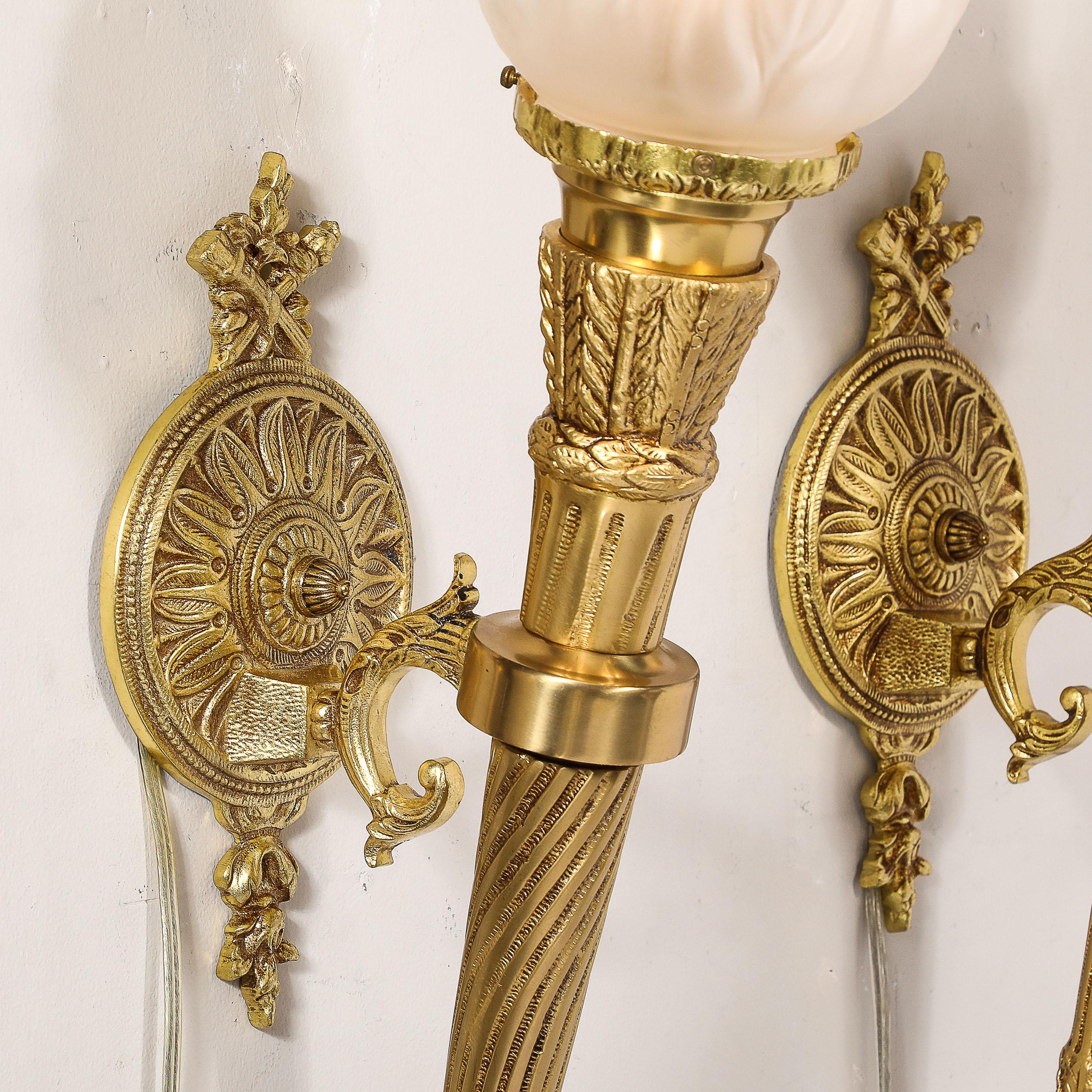 Pair of Neoclassical Torch Sconces in Frosted Glass and Antique  Brass In Excellent Condition For Sale In New York, NY