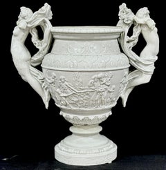 Pair Of Neoclassical White Pottery Urns With Greek Motif