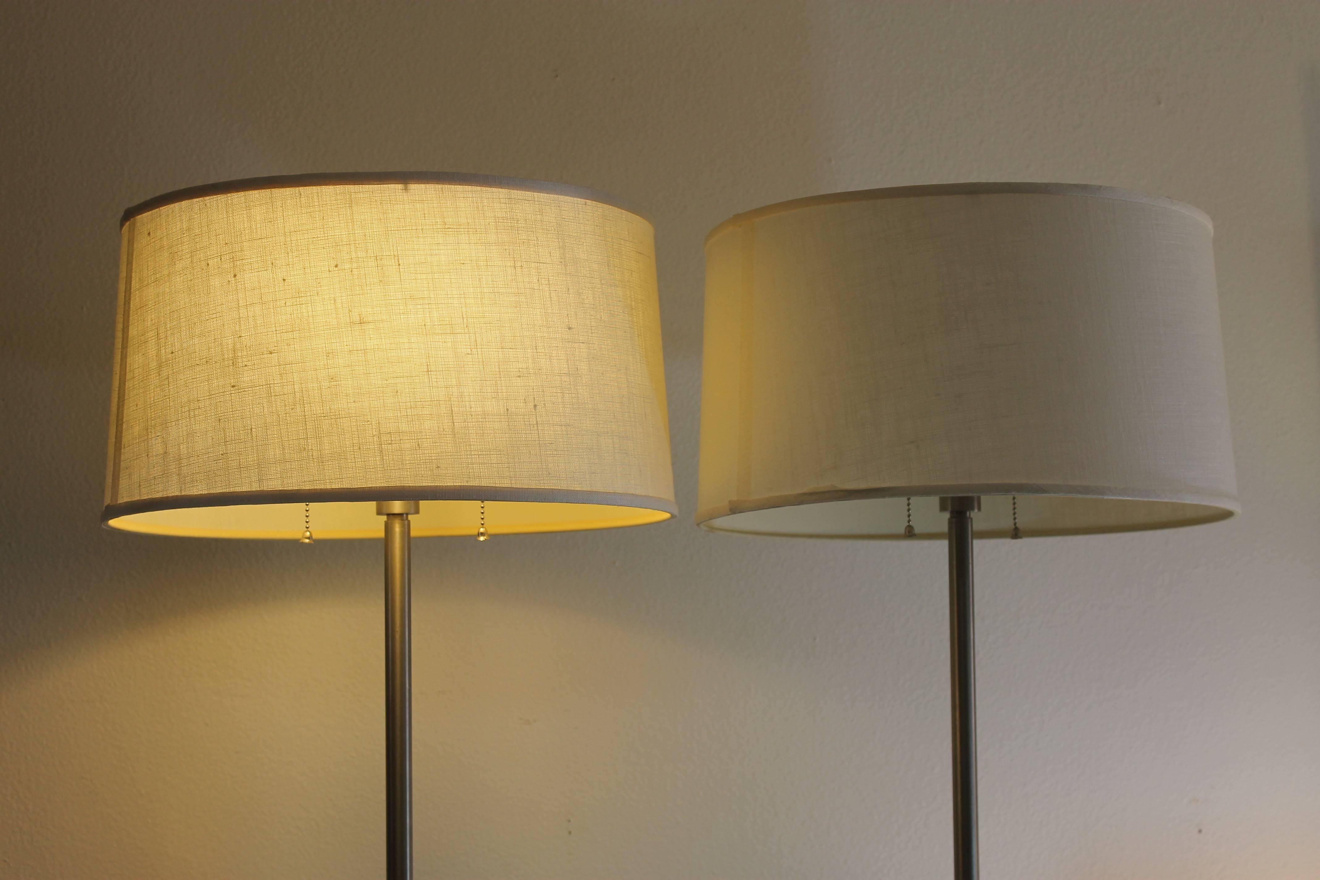 Pair of Nessen floor lamps with original shades and metal diffusers. Total height is 55.5