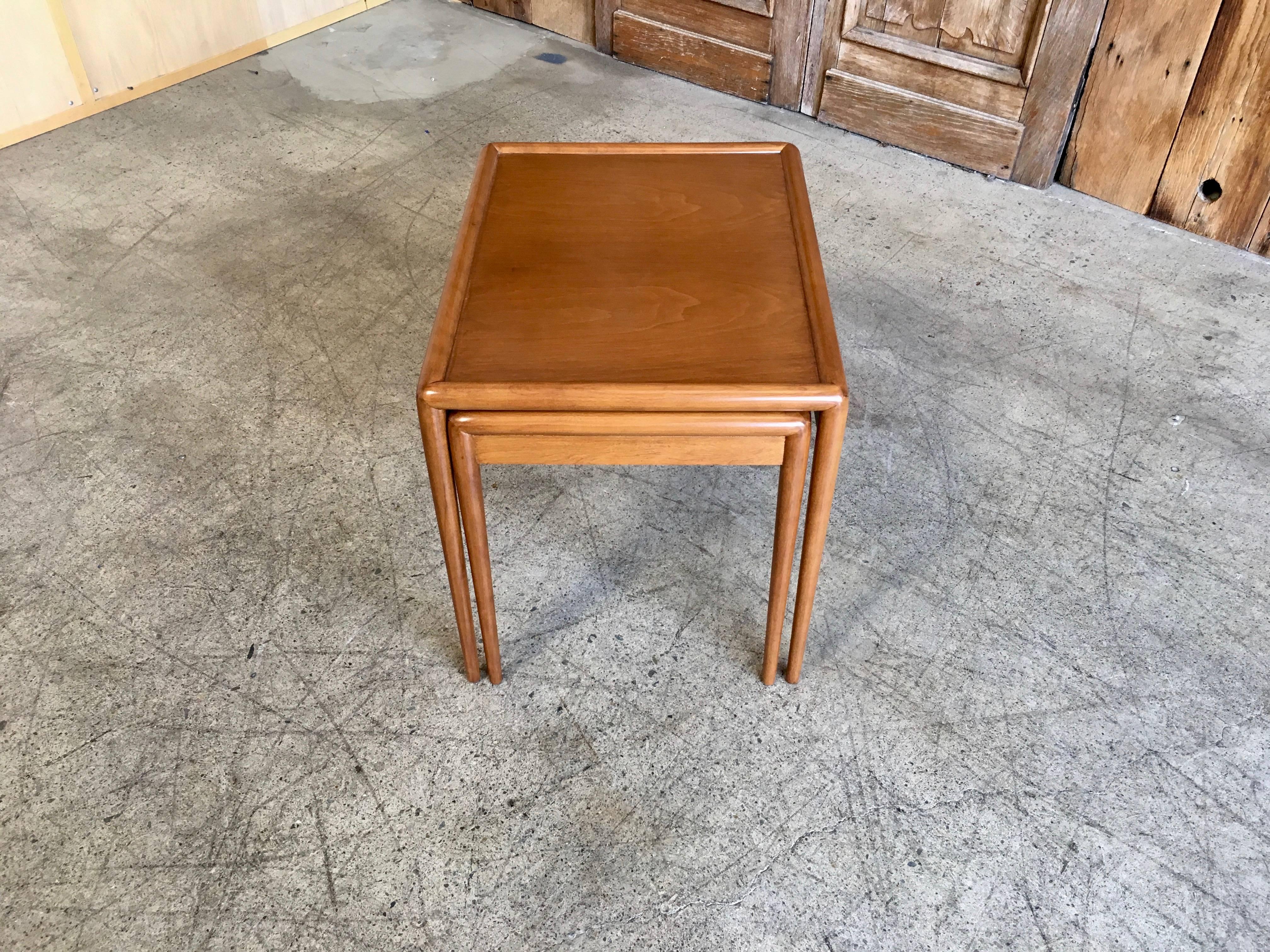 A beautiful pair of model no. 1783 midcentury nesting tables by American designer T.H. Robsjohn-Gibbings.
Big table dimensions: 24.75 D, 19.25 L, 20.5 H
Small Table dimensions: 23.75 D, 16.5 L, 19 H.