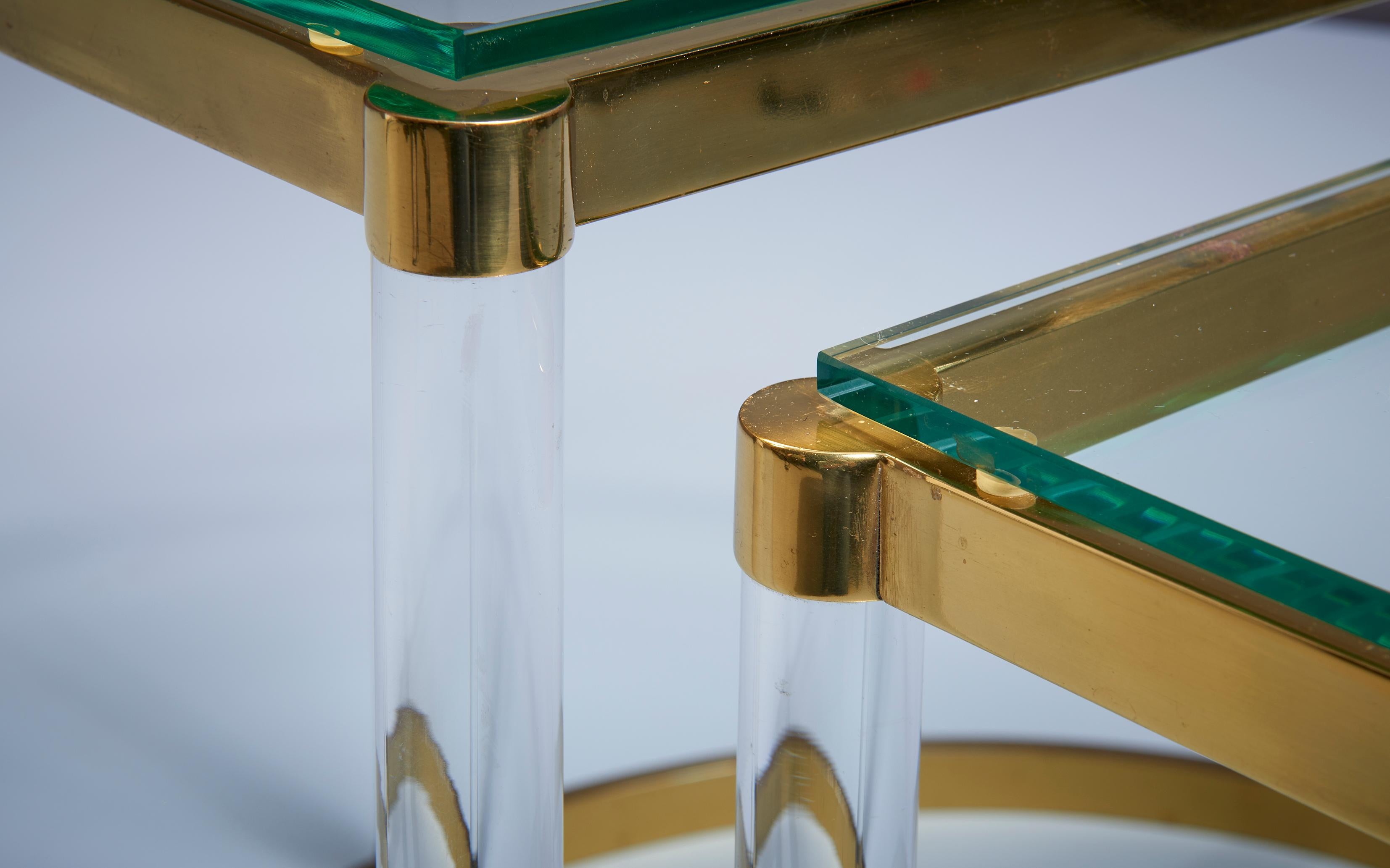 Pair of Nesting Tables in Brass & glass in the manner of Charles Hollis Jones For Sale 2