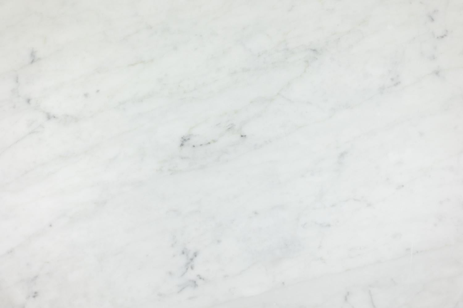 Marble Pair of nesting tables in Carrara marble. Contemporary. For Sale