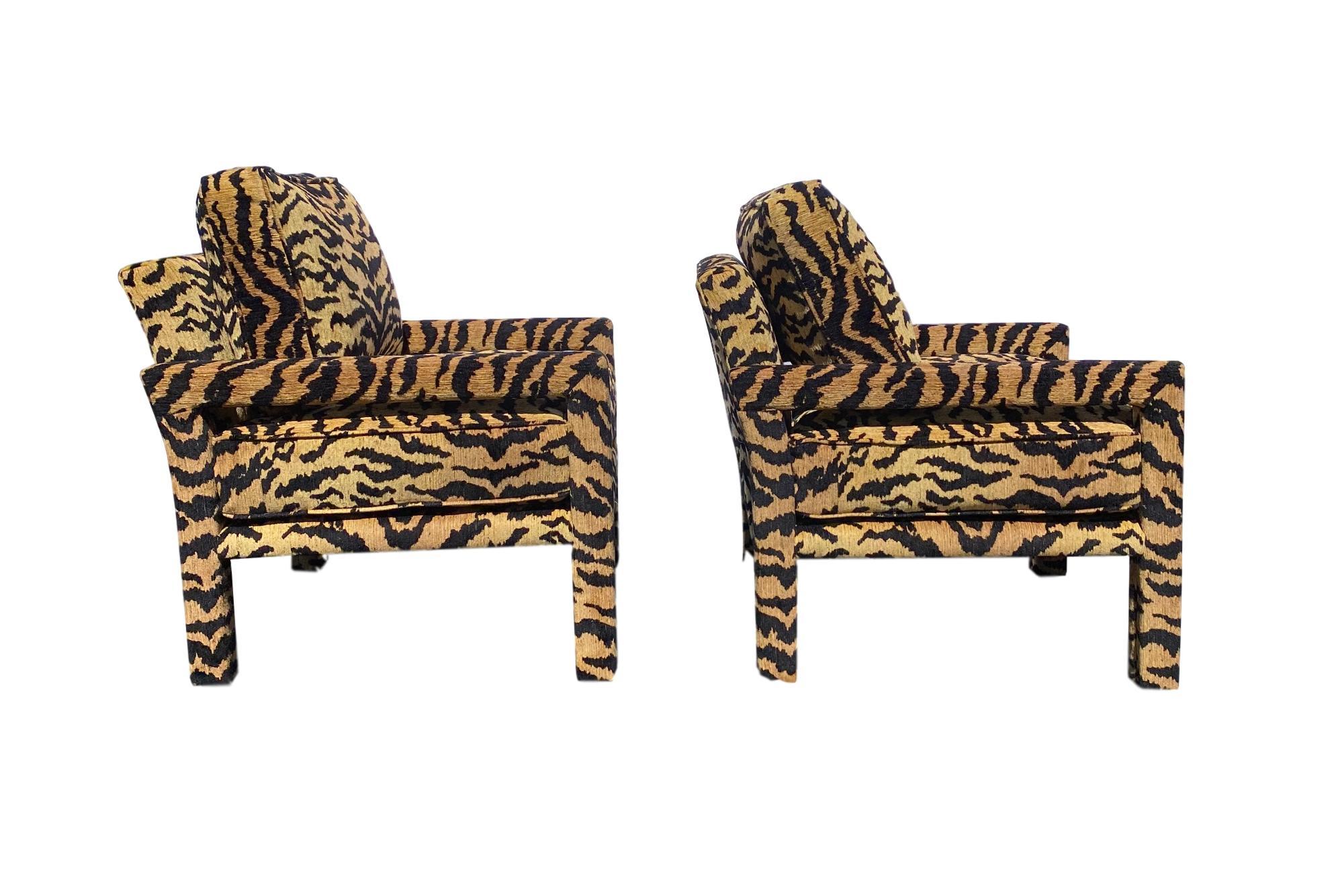 Pair of New Milo Baughman style parsons chairs upholstered in high-end designer tiger fabric, woven, heavy cut and uncut chenille; the hand of the fabric is unexpectedly soft and luxurious. Our chairs are handcrafted and upholstered from new