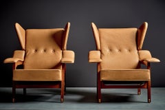 Coppia di nuove sedie da salotto imbottite in pelle cognac di Camo, Italia anni '50