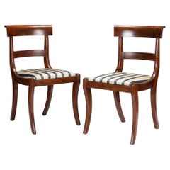 Antique Pair of New York mahogany Klismos slip seat side chairs, 1825