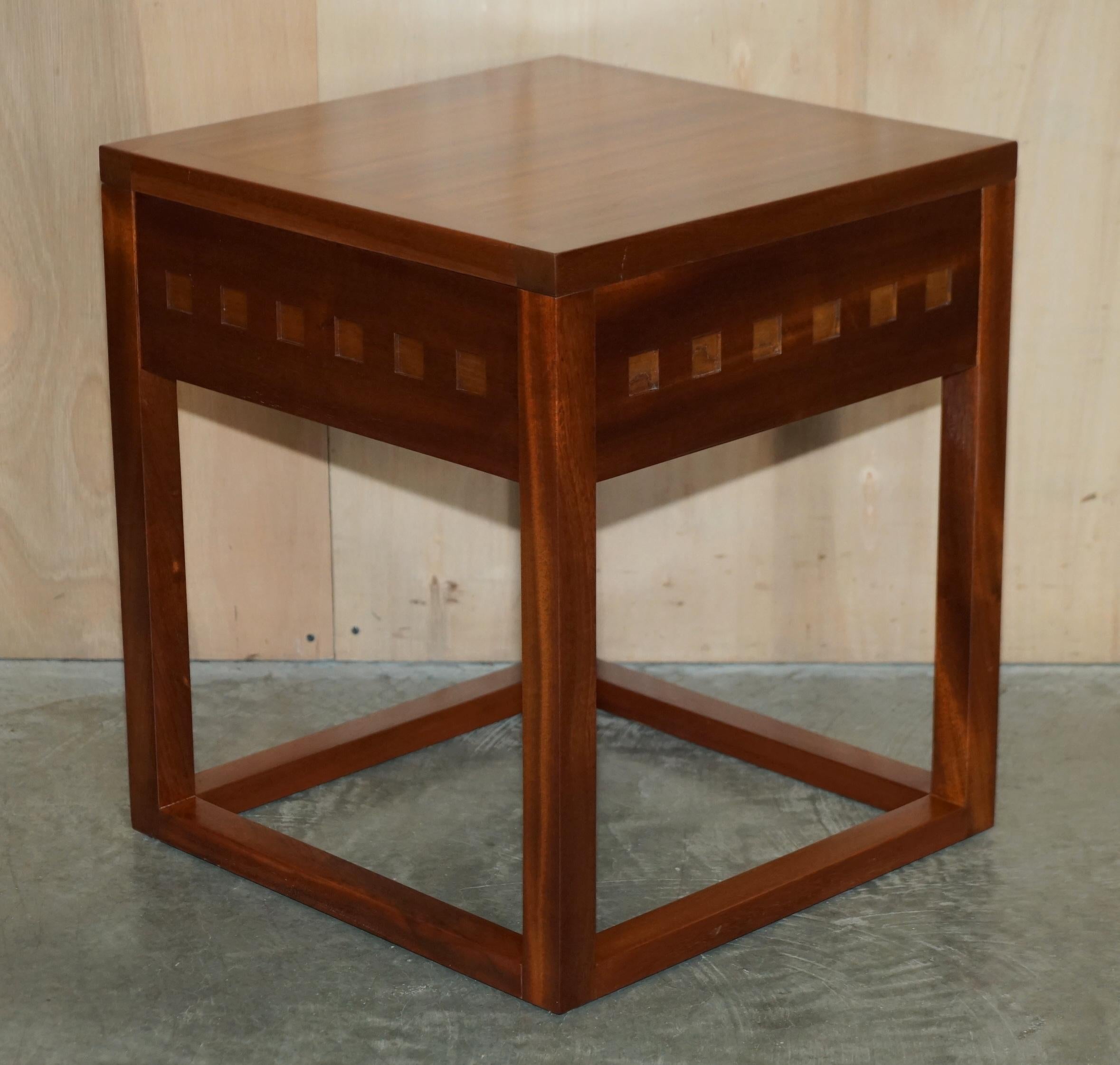 We are delighted to offer for sale this lovely pair of Cherry wood and teak side tables which are part of a set

These are very well made and good-looking,the teak and cherry give them a nice natural feel

The condition is very good, we have