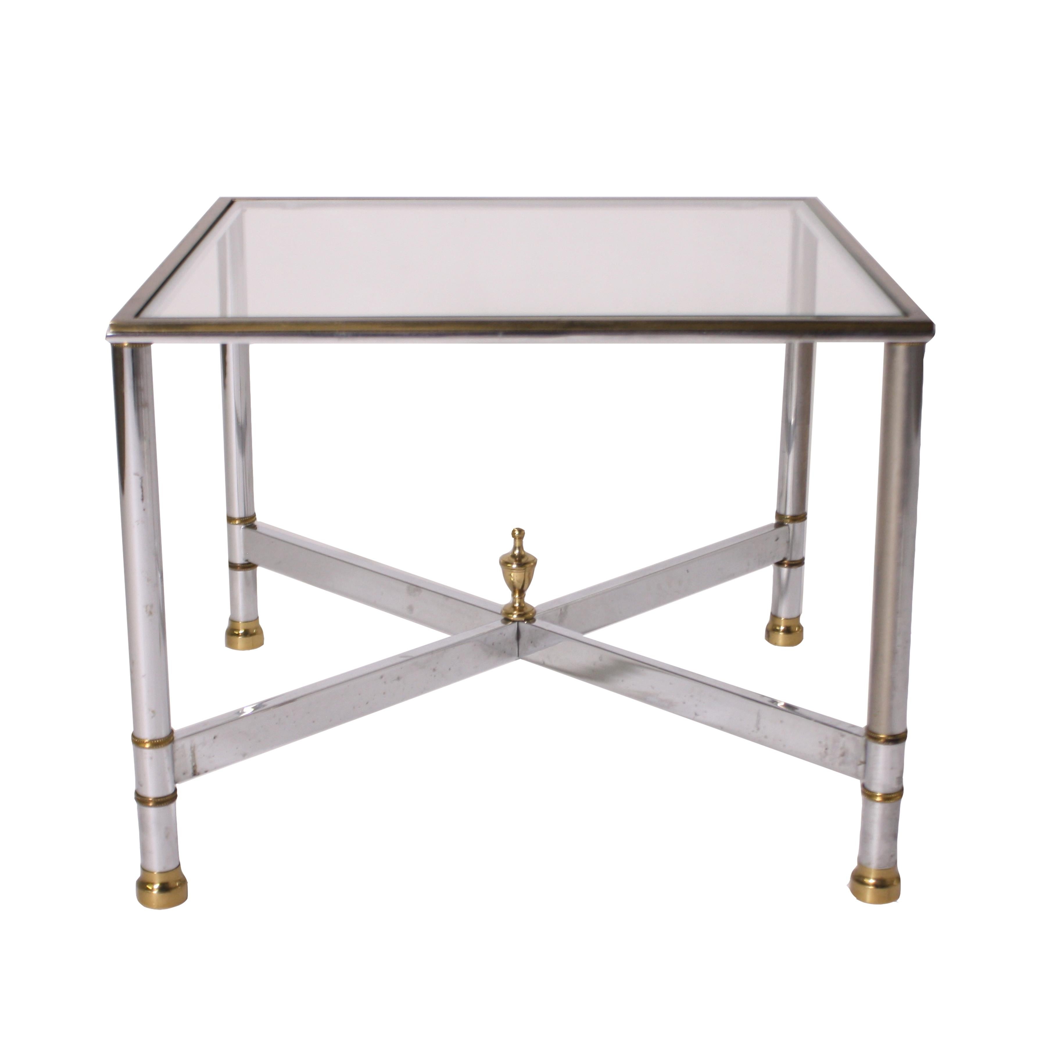 Pair of nickel and brass tables, circa 1950.