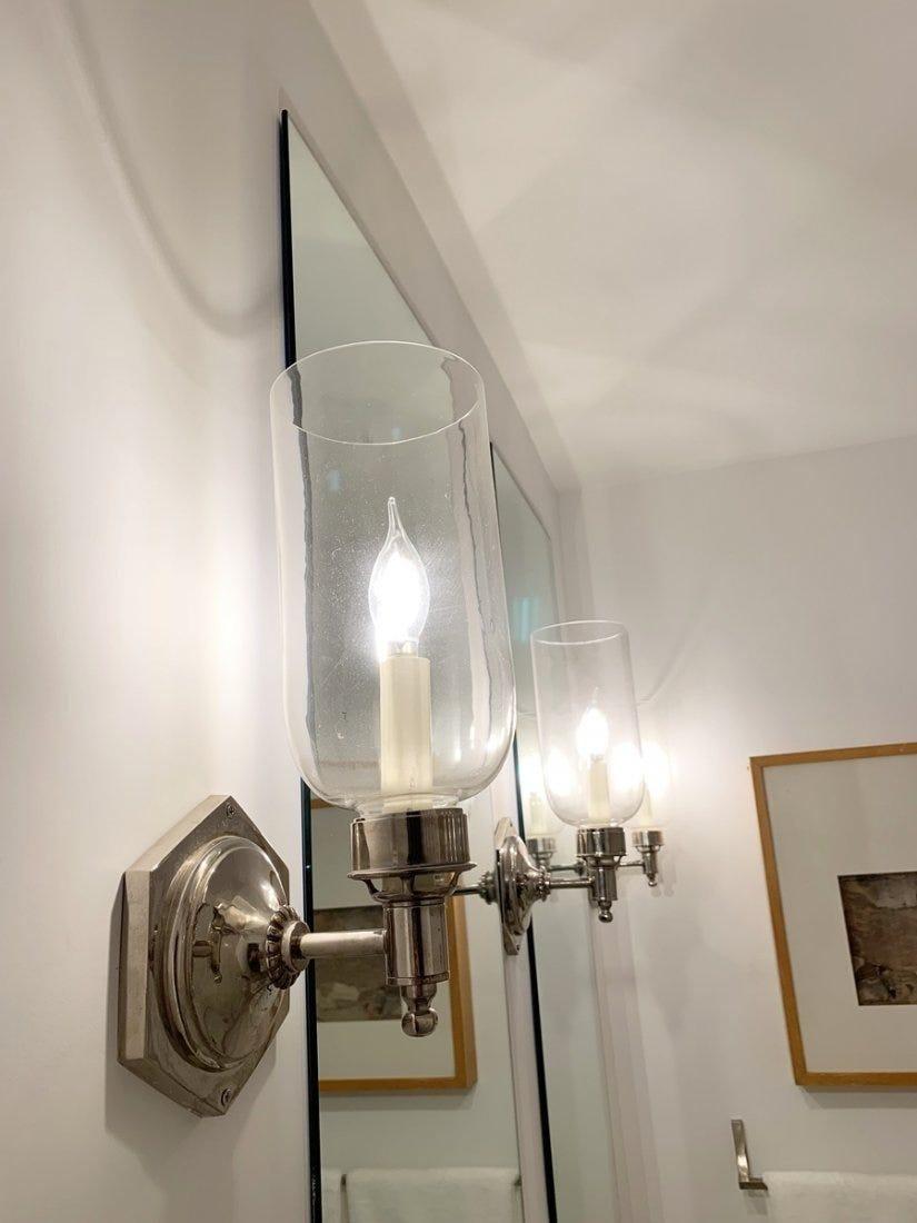 Beautiful pair of nickel and glass wall sconces.

These sconces are hand made in London by Charles Edwards of London and part of the Palmer Collection and with the Osler glass shade.

We have a total of 6 sconces and they are being sold in