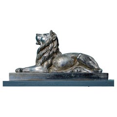 Pair of Nickel Plated Recumbent Lions
