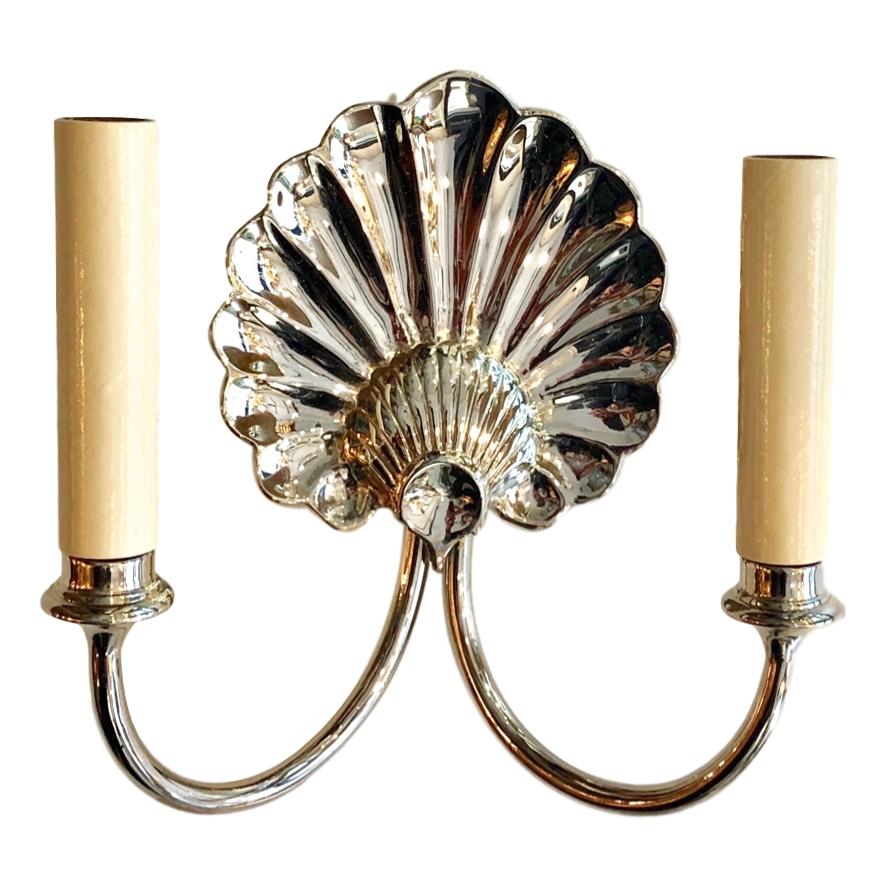 Pair of circa 1950's French nickel-plated two-arm shell-shaped sconces.

Measurements:
Height: 8