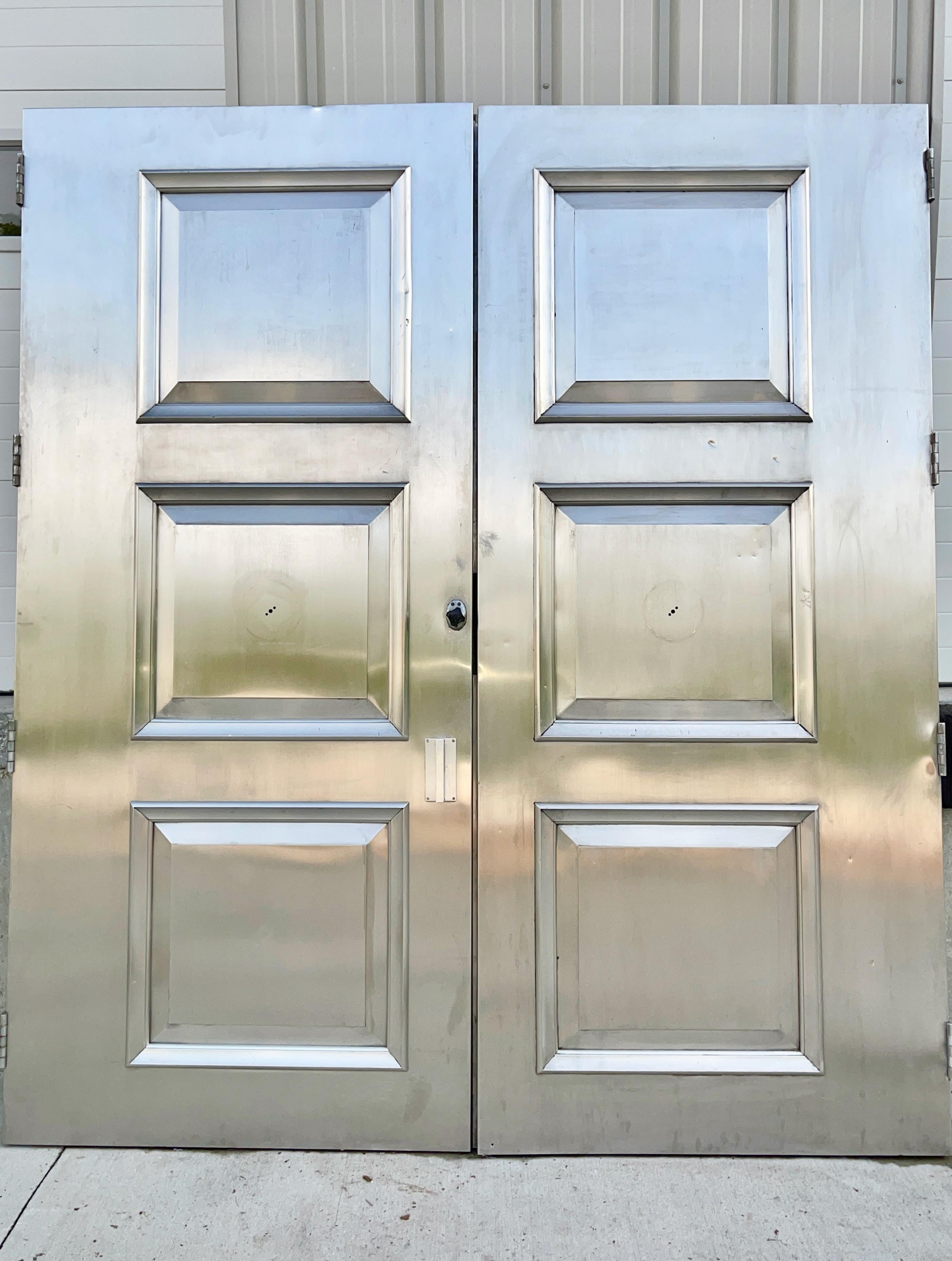 Art Deco Pair of Nickel Silver Three Paneled Double Doors For Sale